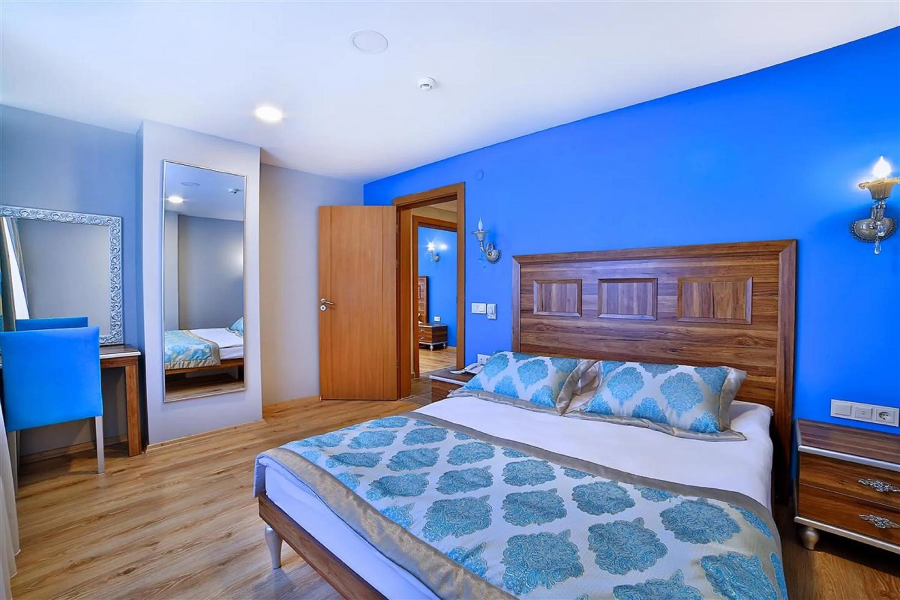 Bed in The Hera Premium Hotels