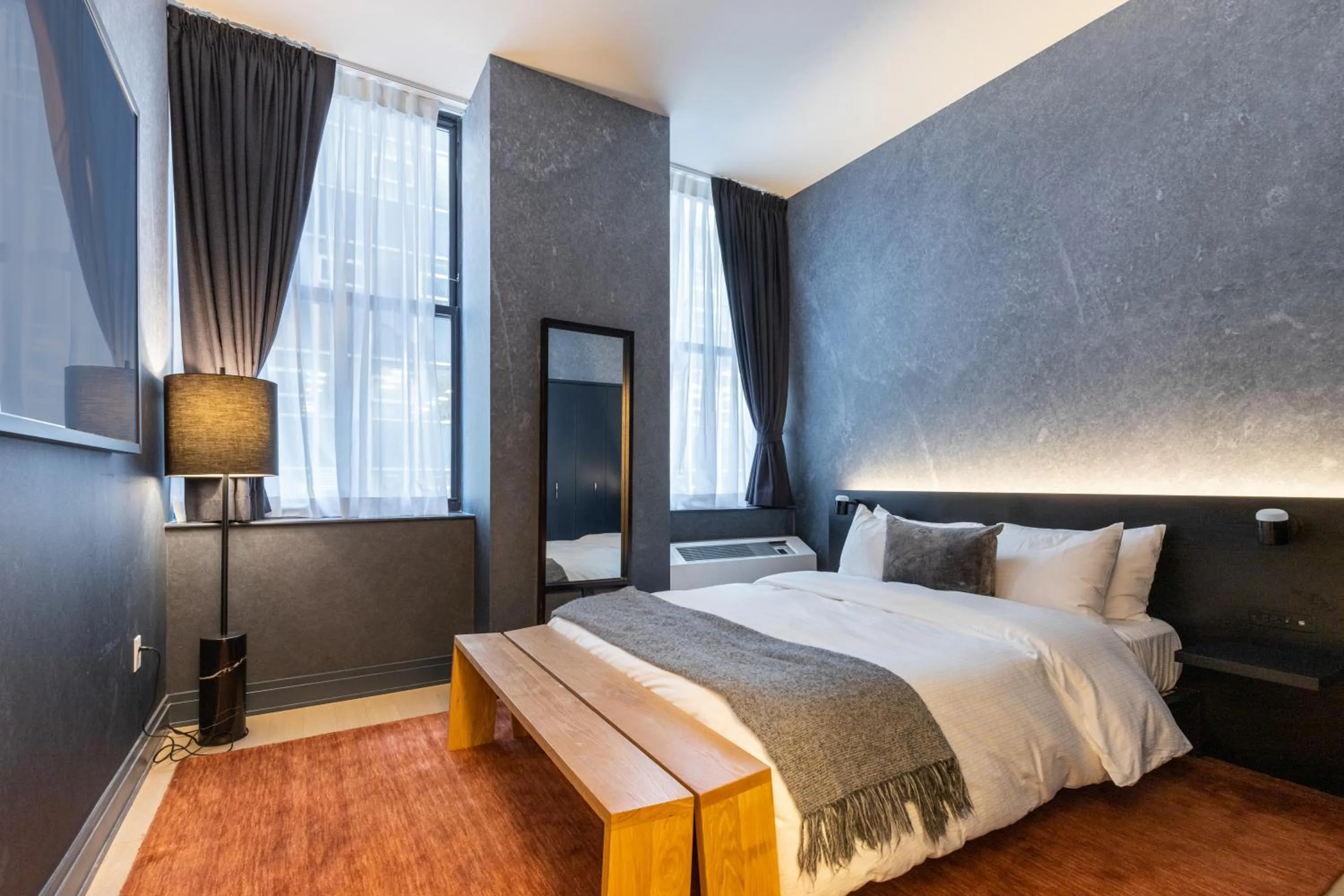 Bed in Mint House at 70 Pine