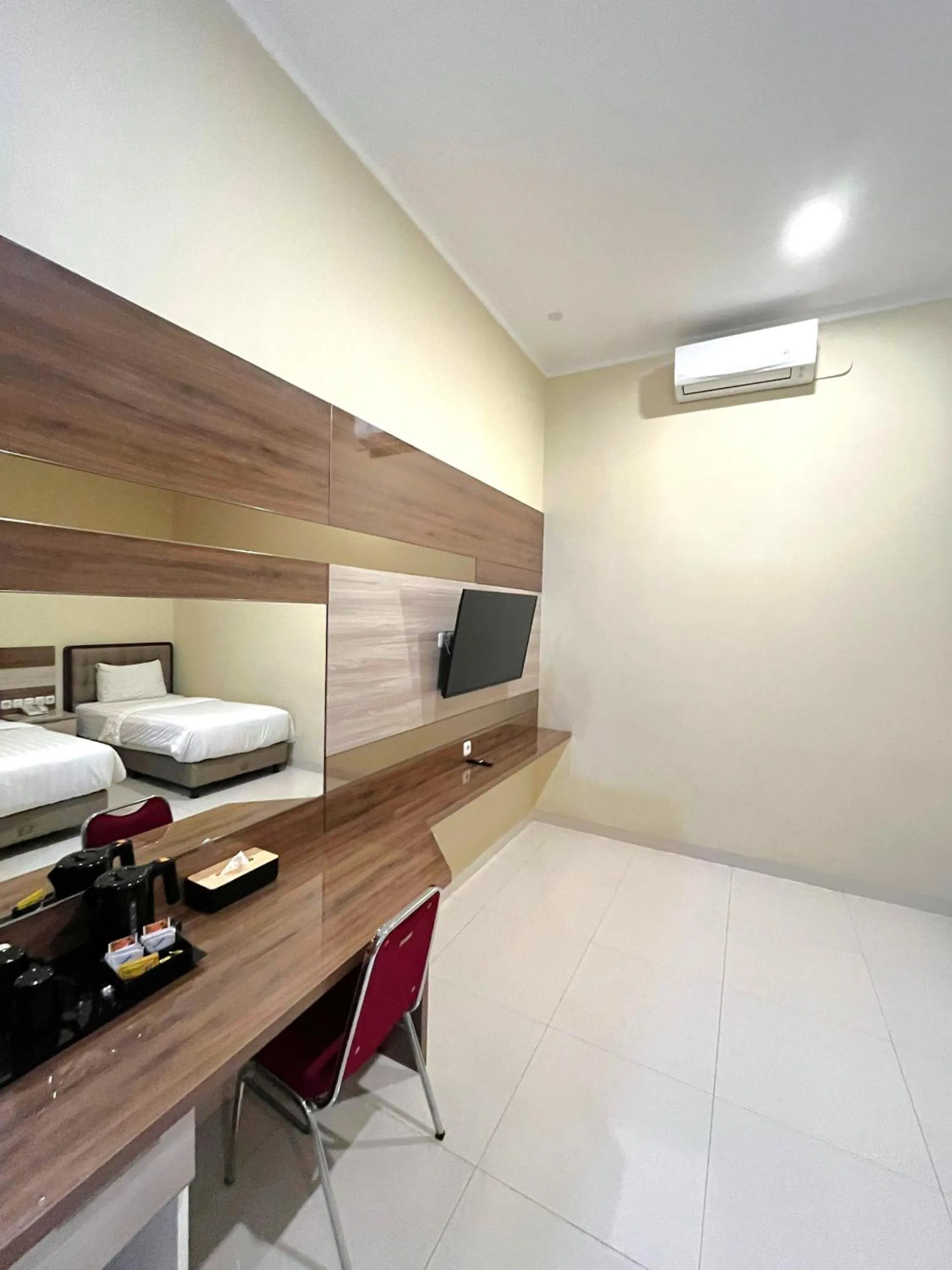 Bed in Alloro Boutique Hotel Pacitan