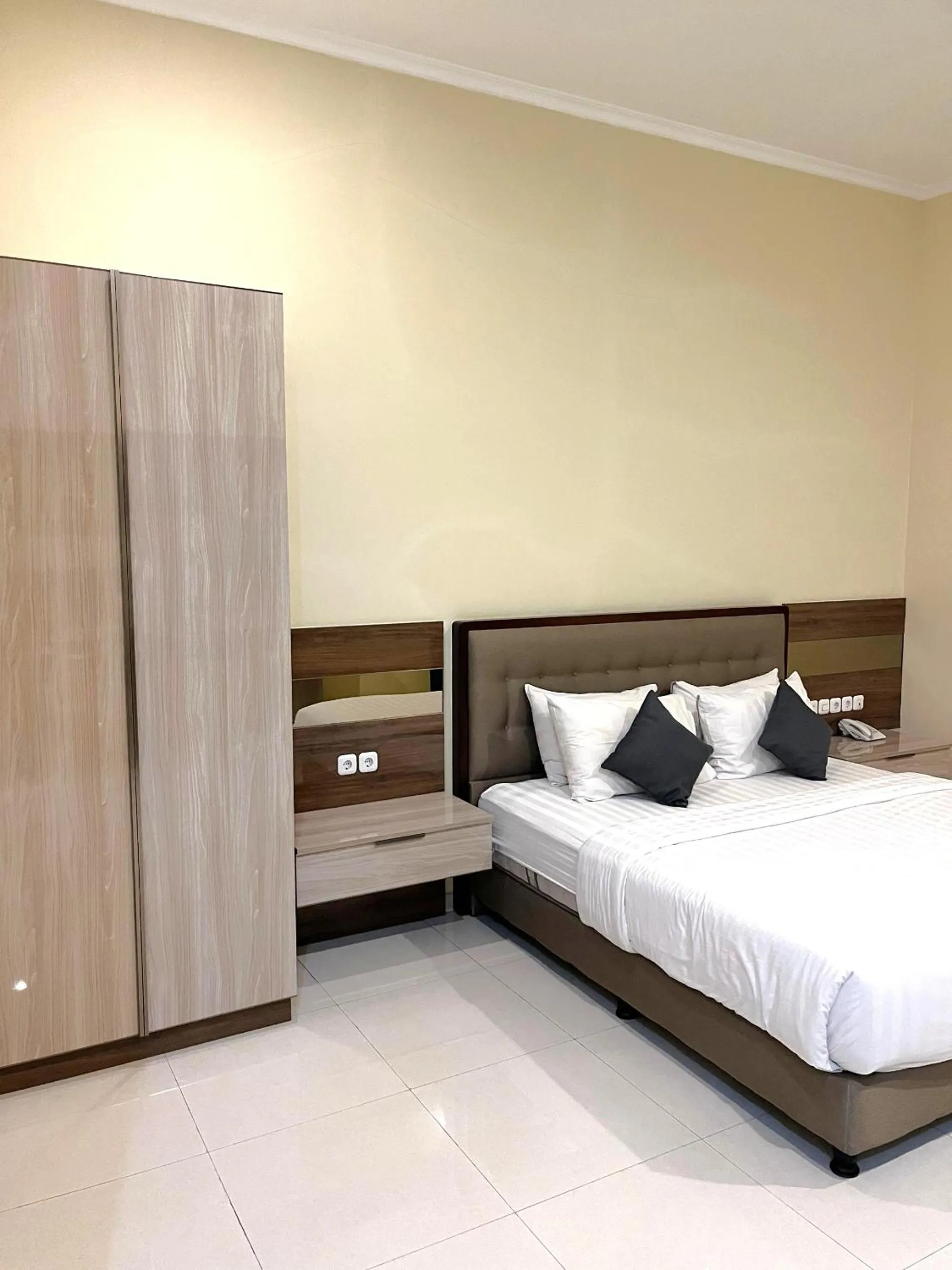 Bed in Alloro Boutique Hotel Pacitan