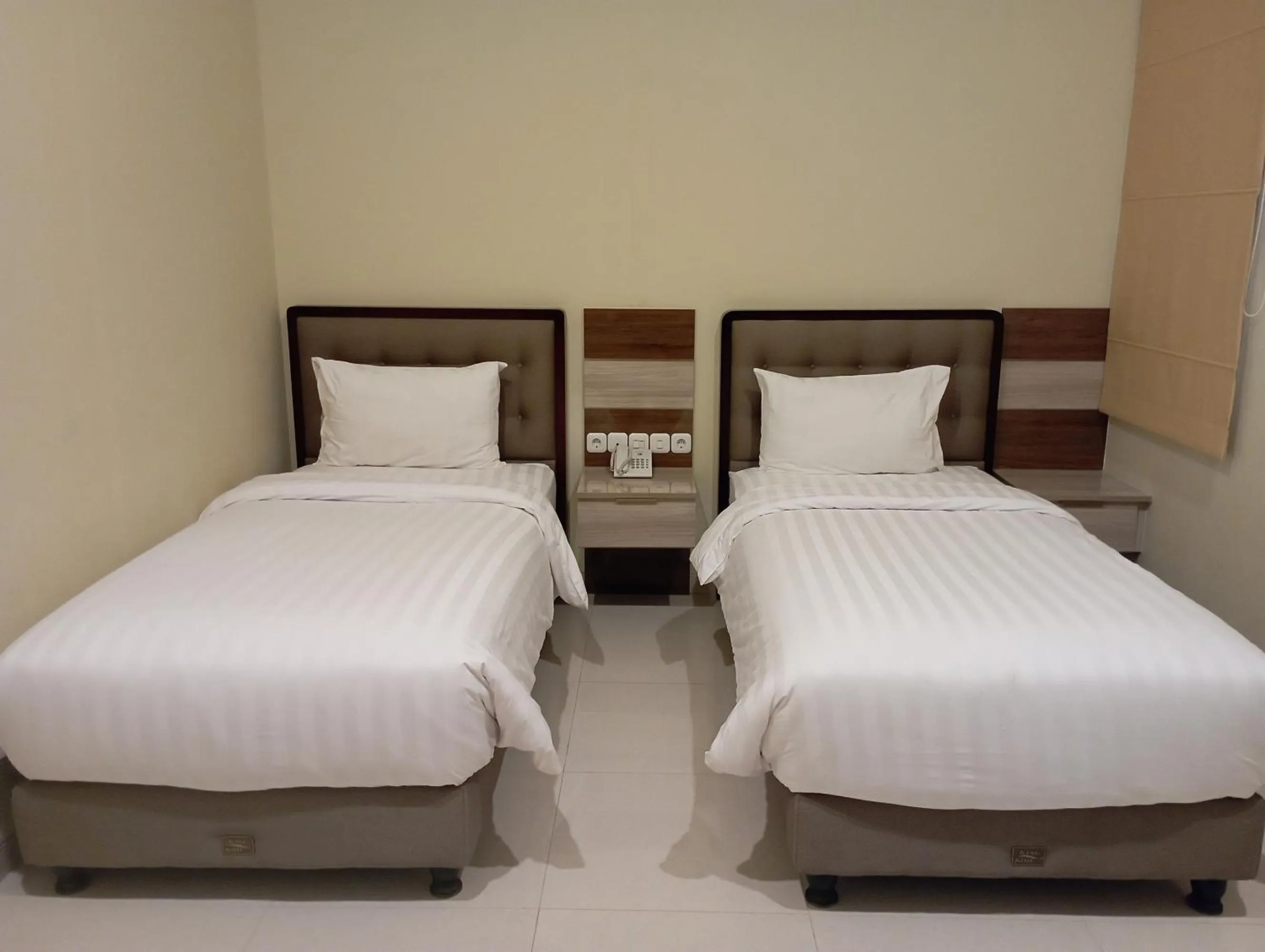Bed in Alloro Boutique Hotel Pacitan