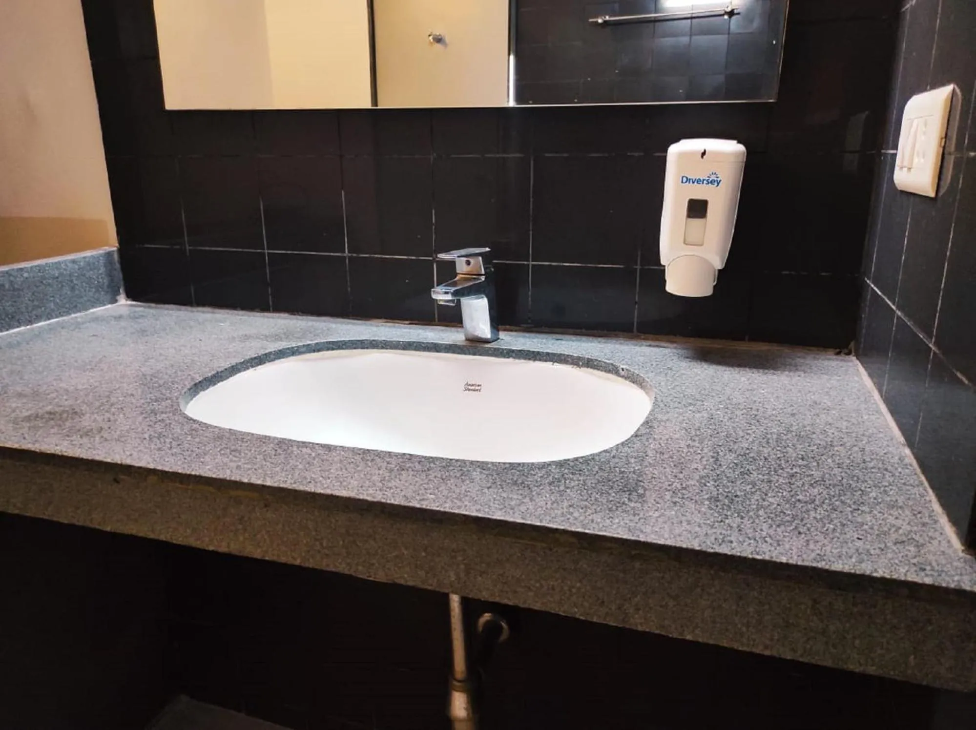 Bathroom in Krishna Inn - Royal Hotels