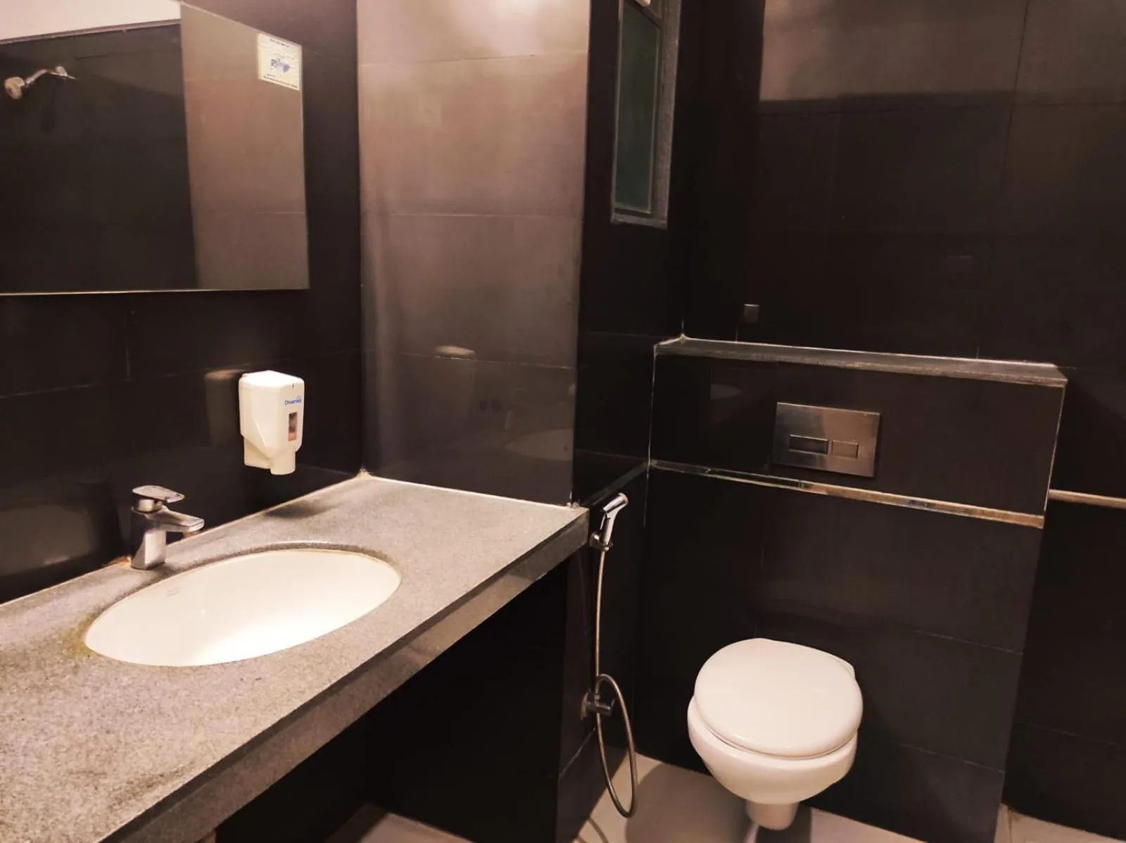 Bathroom in Krishna Inn - Royal Hotels