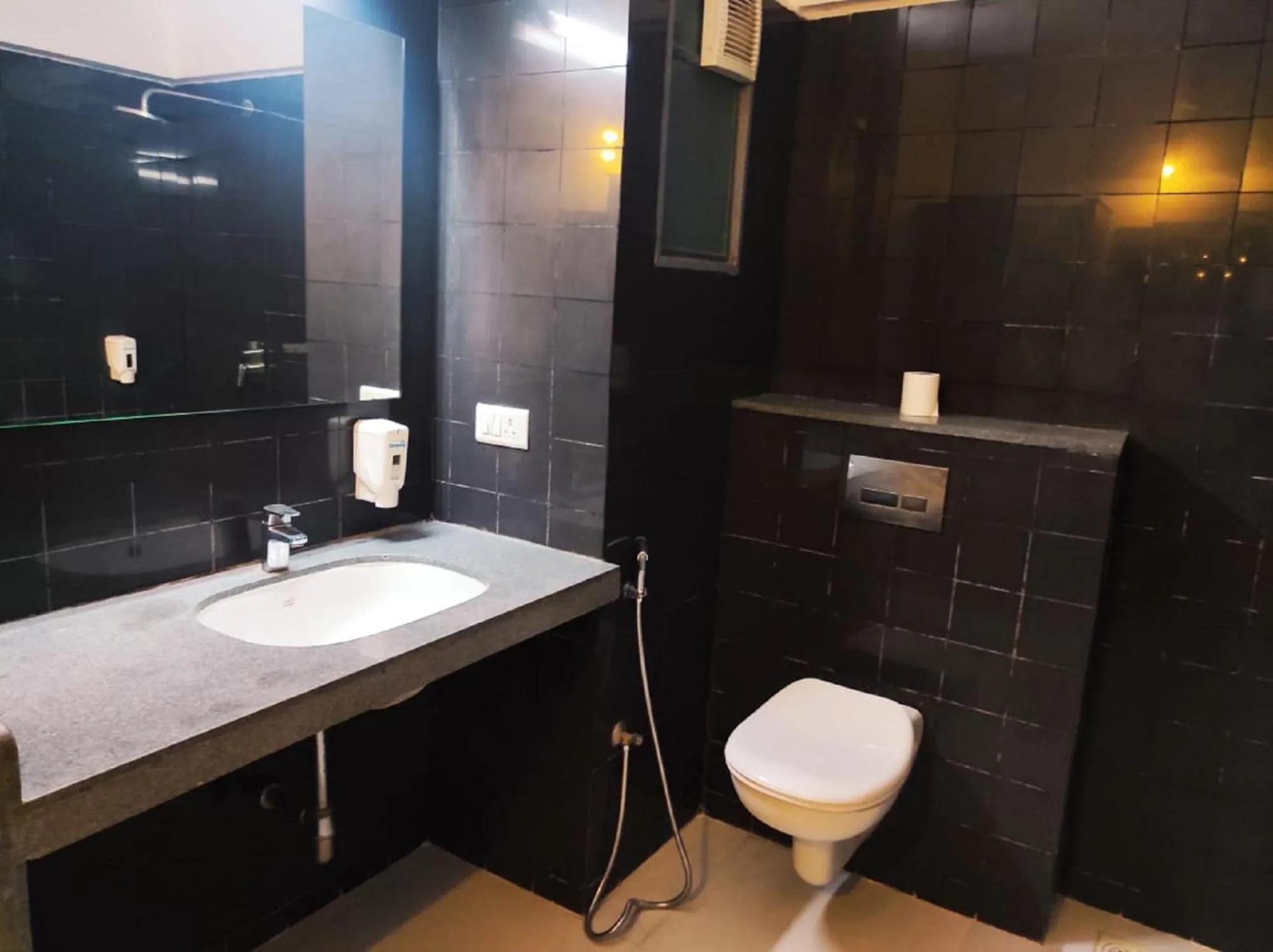 Bathroom in Krishna Inn - Royal Hotels