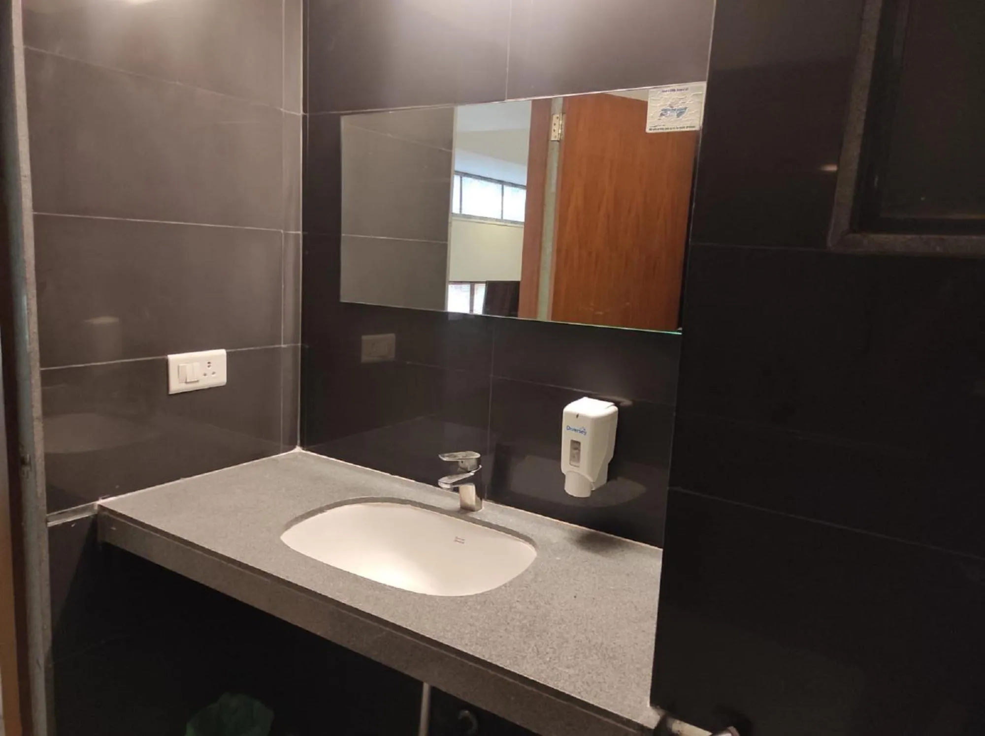 Bathroom in Krishna Inn - Royal Hotels