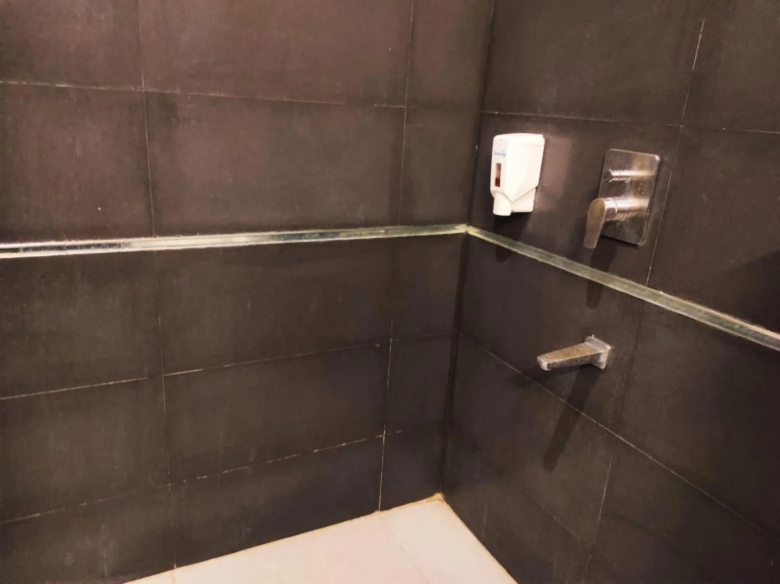 Bathroom in Krishna Inn - Royal Hotels