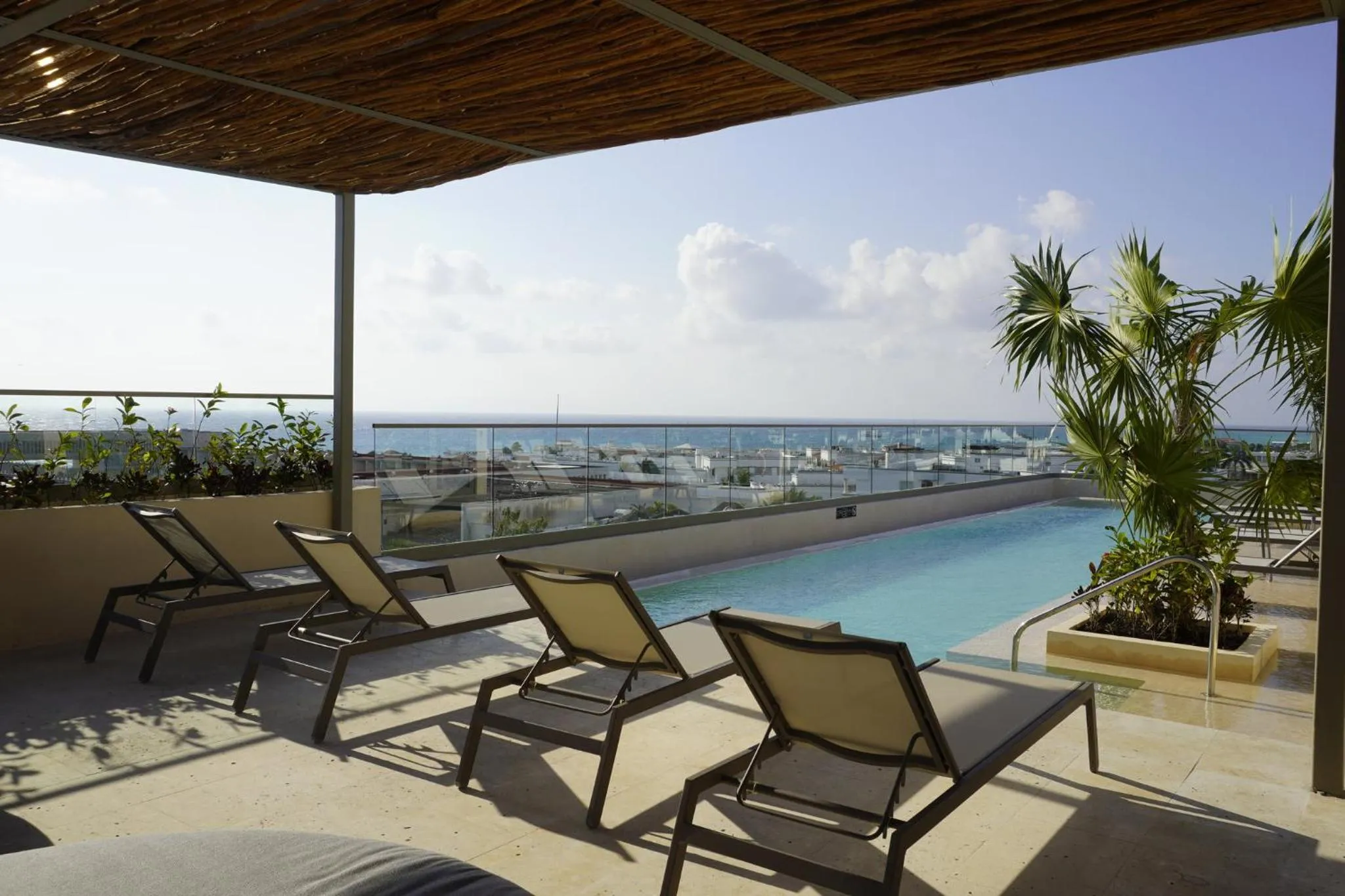 Swimming pool in Hotel Indigo Playa del Carmen by IHG