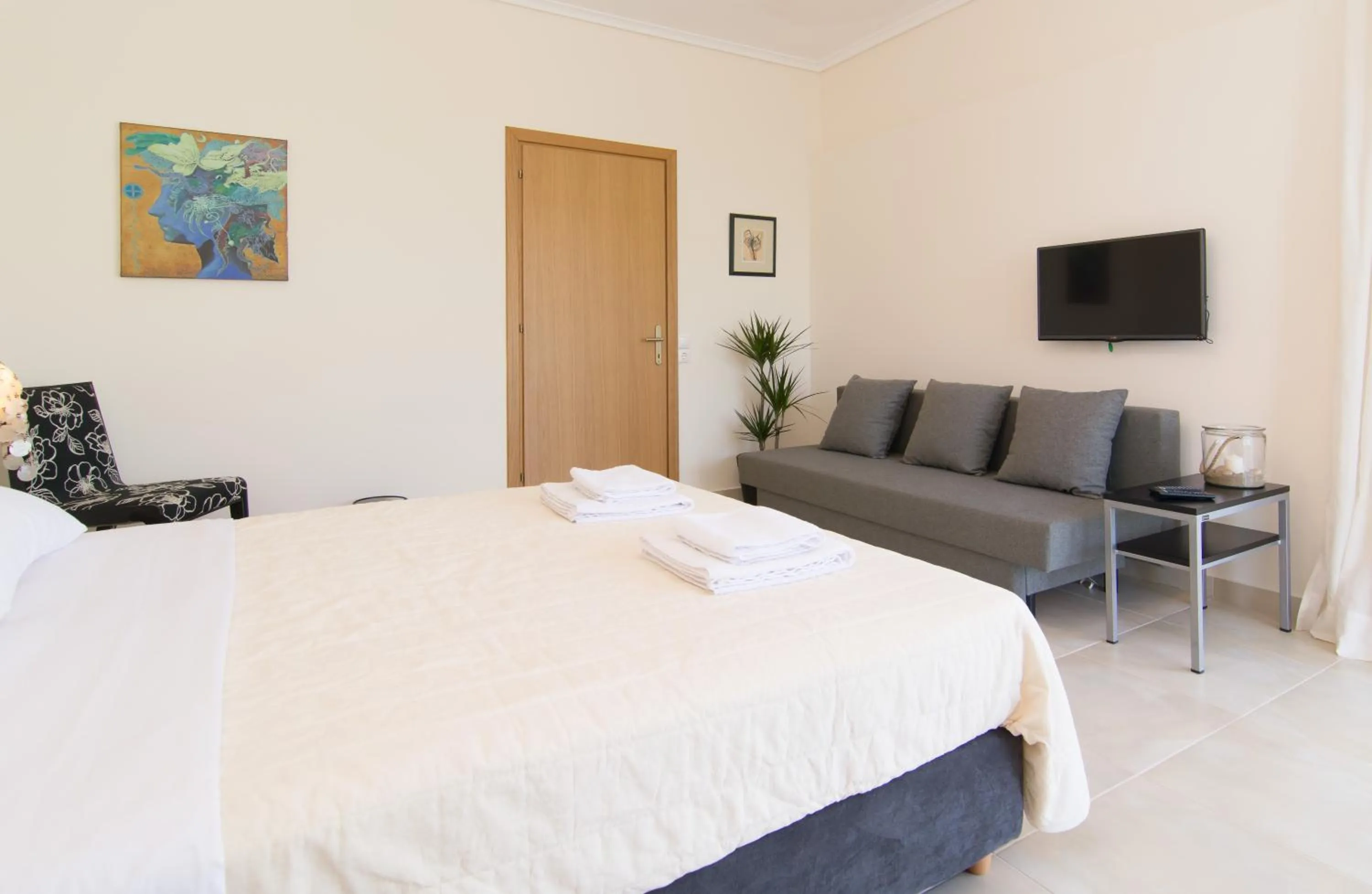 Seating area, Bed in Angelbay Bungalows