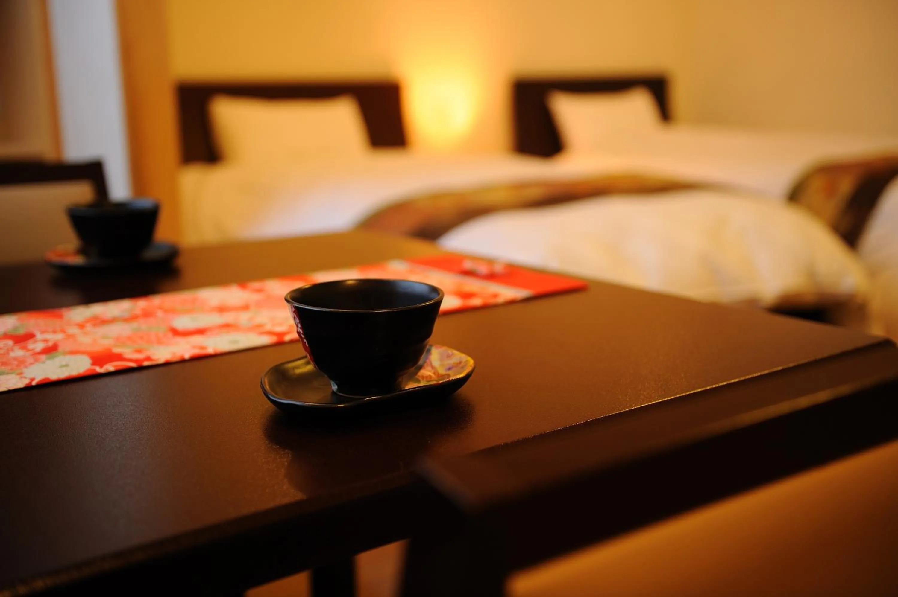 Decorative detail, Bed in Suzukiya Ryokan