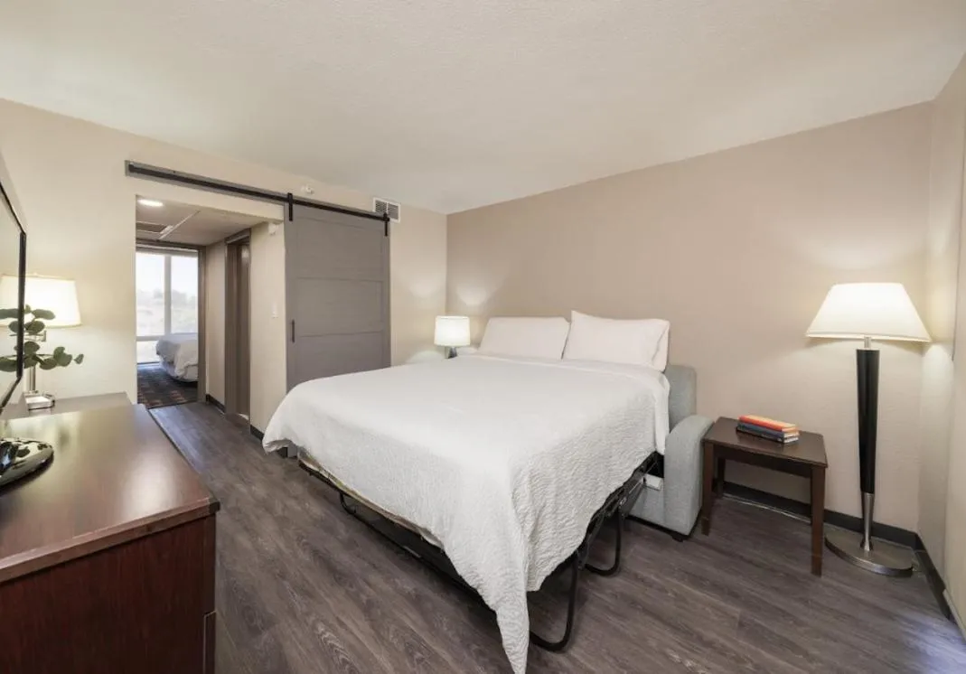 Bed in South Country Suites