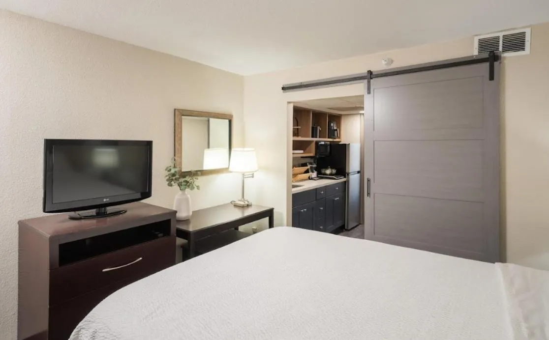 Bed in South Country Suites