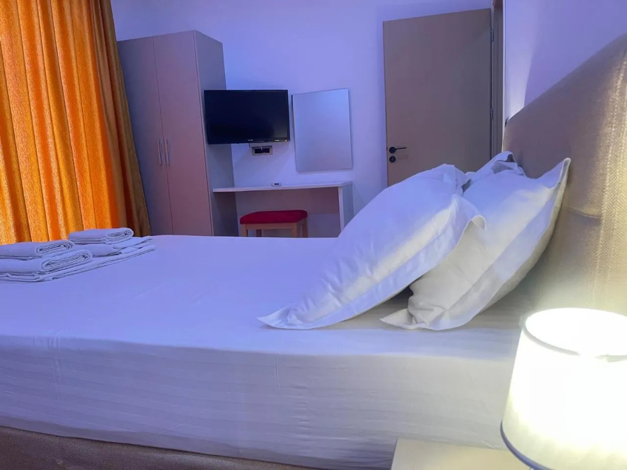 Bedroom in Nemesis Hotel