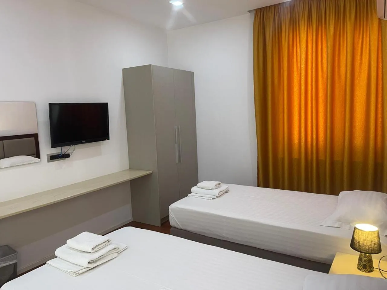 Bedroom in Nemesis Hotel