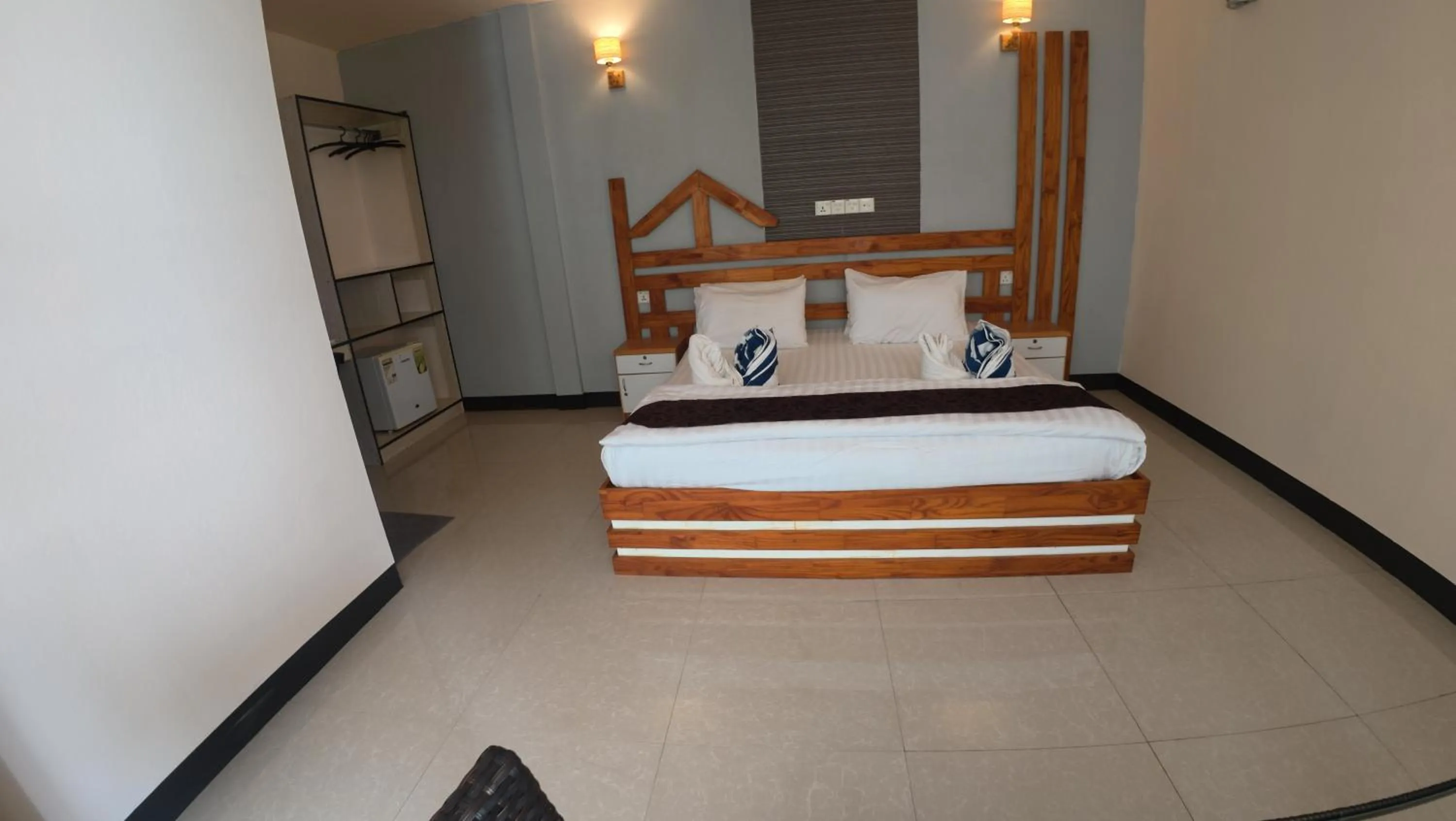 Bed in Liberty Guesthouse Maldives