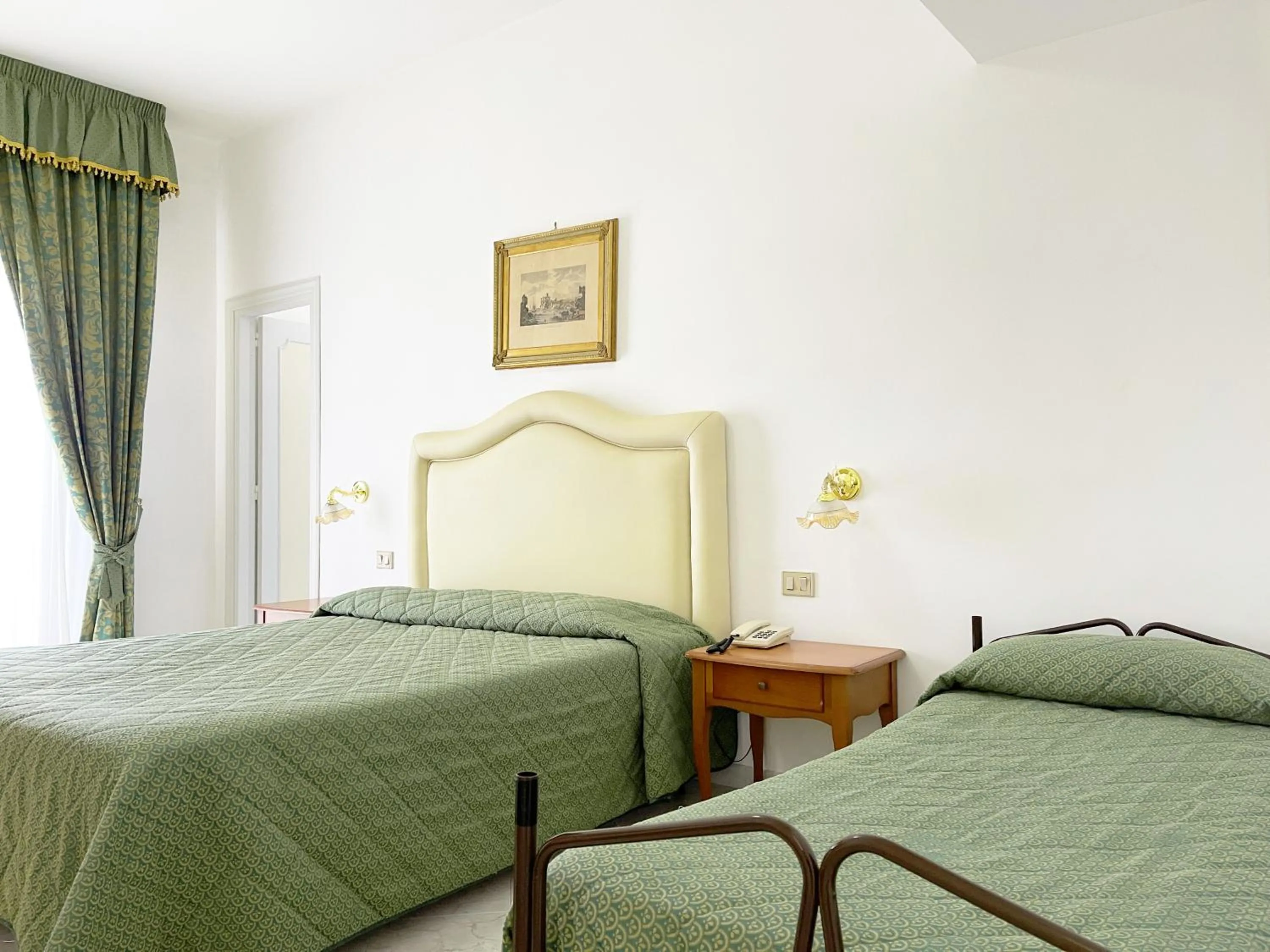 Bed in Hotel Reginella