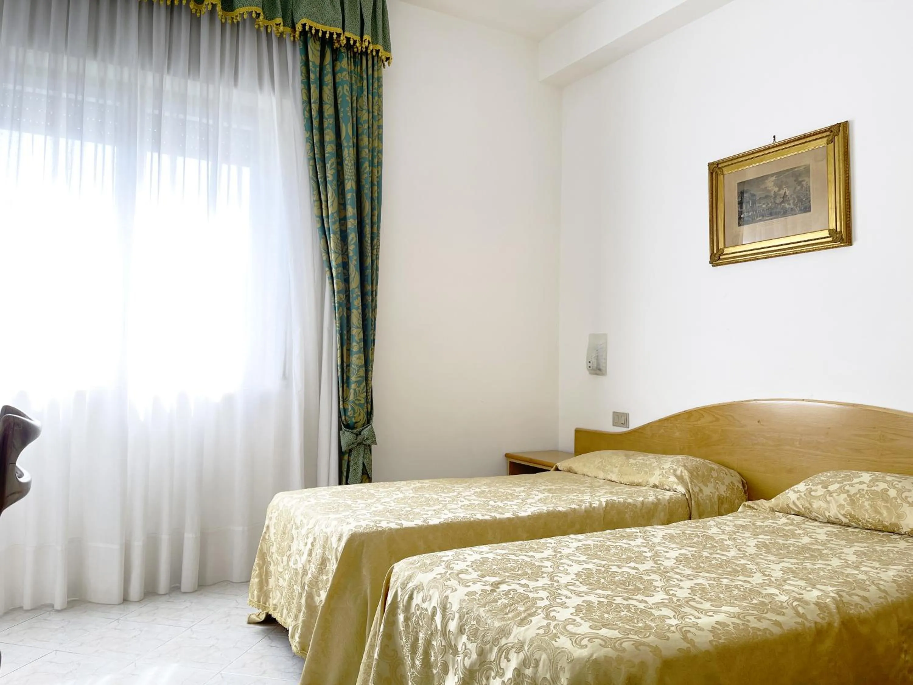 Bed in Hotel Reginella