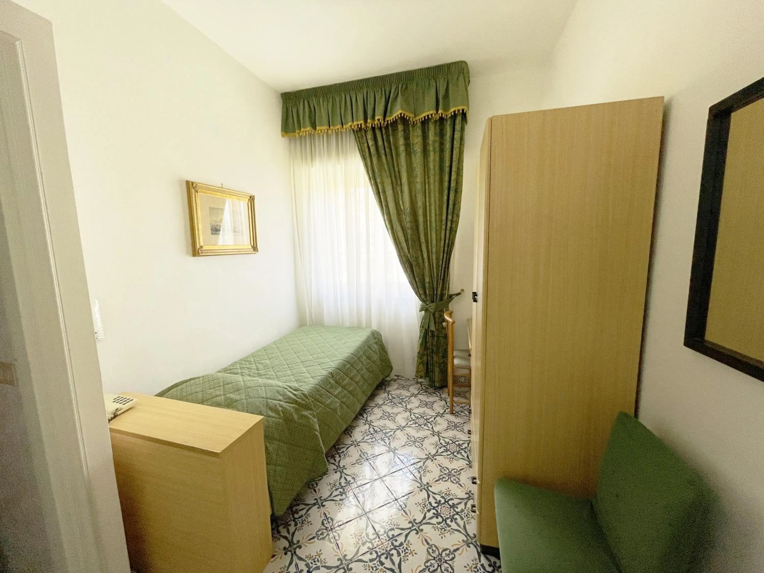 Bedroom in Hotel Reginella