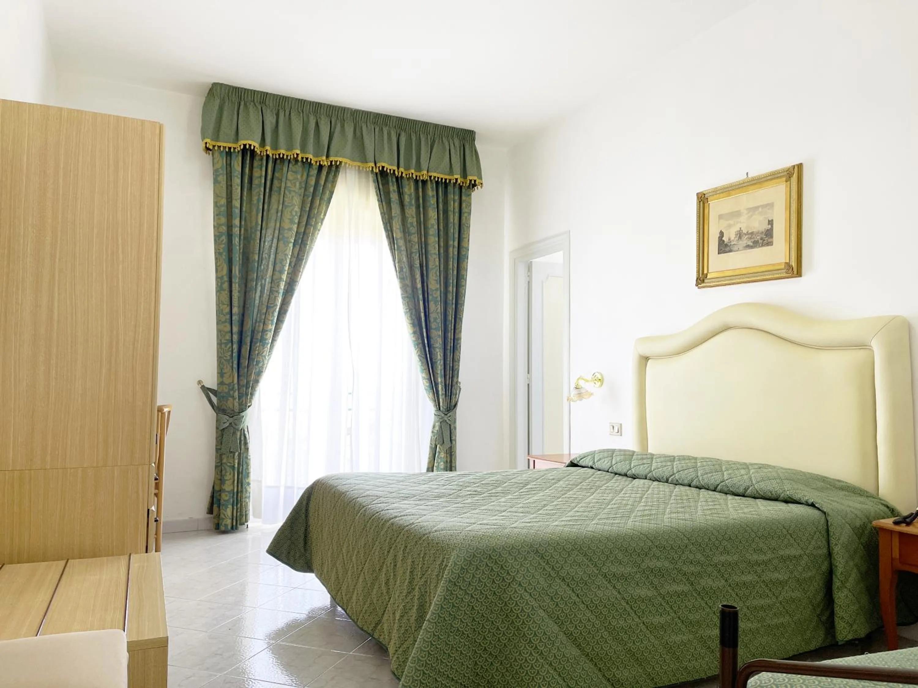Bedroom in Hotel Reginella
