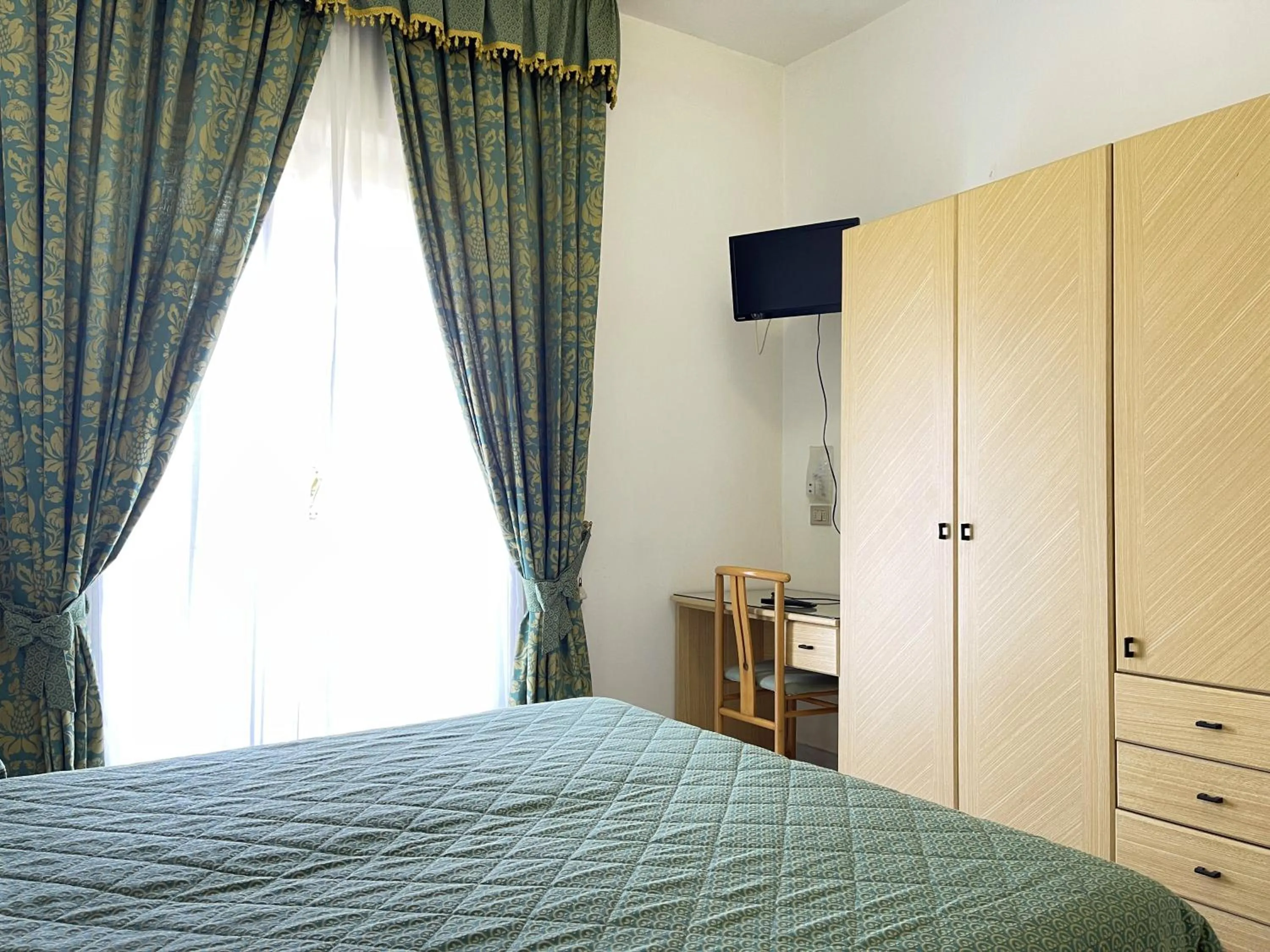 Bed in Hotel Reginella