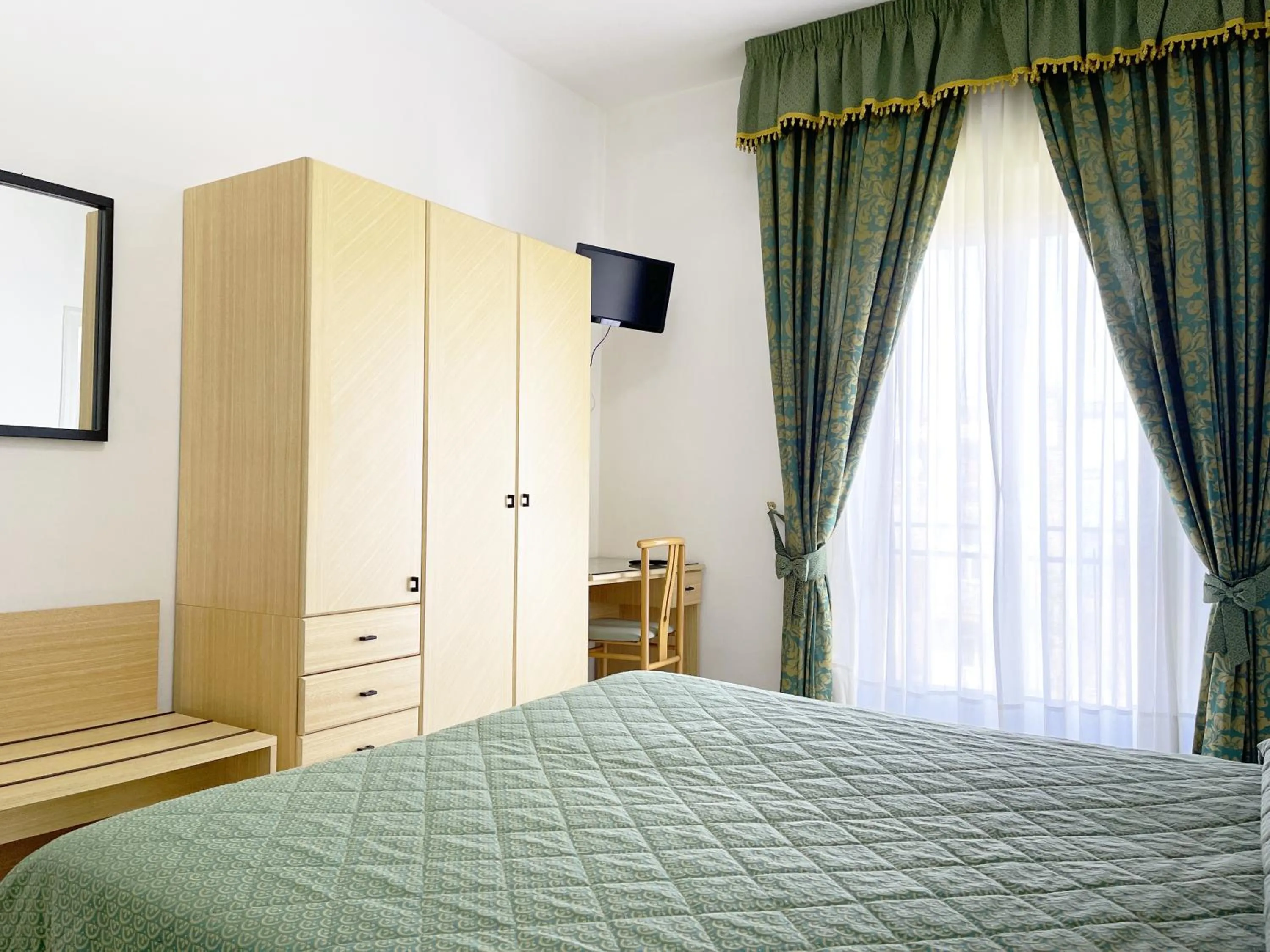 Bedroom in Hotel Reginella