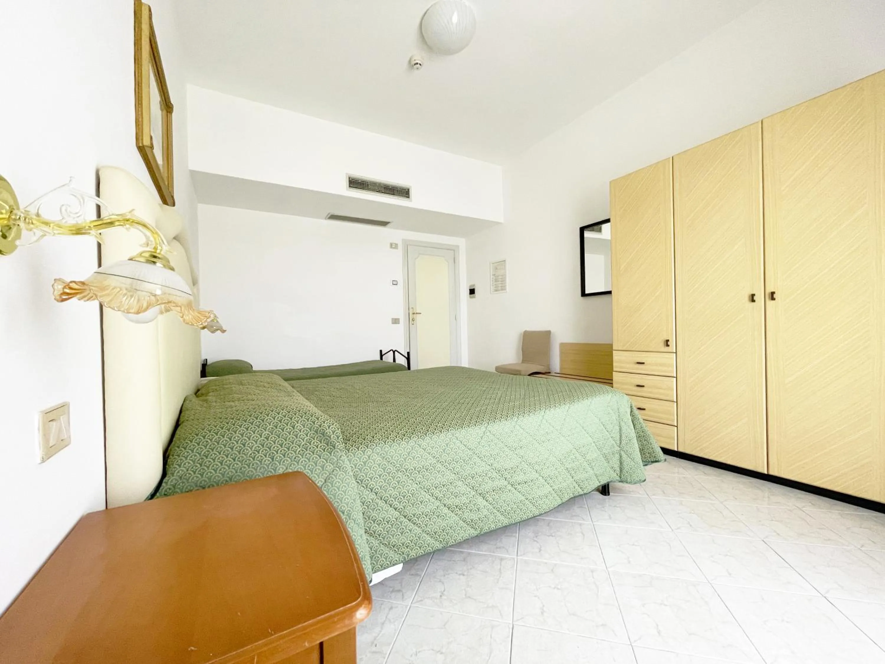 Bedroom in Hotel Reginella