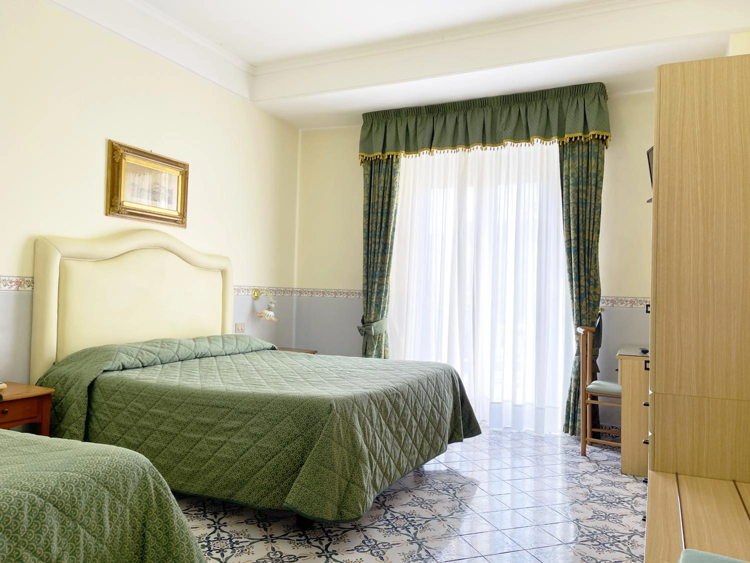 Bed in Hotel Reginella