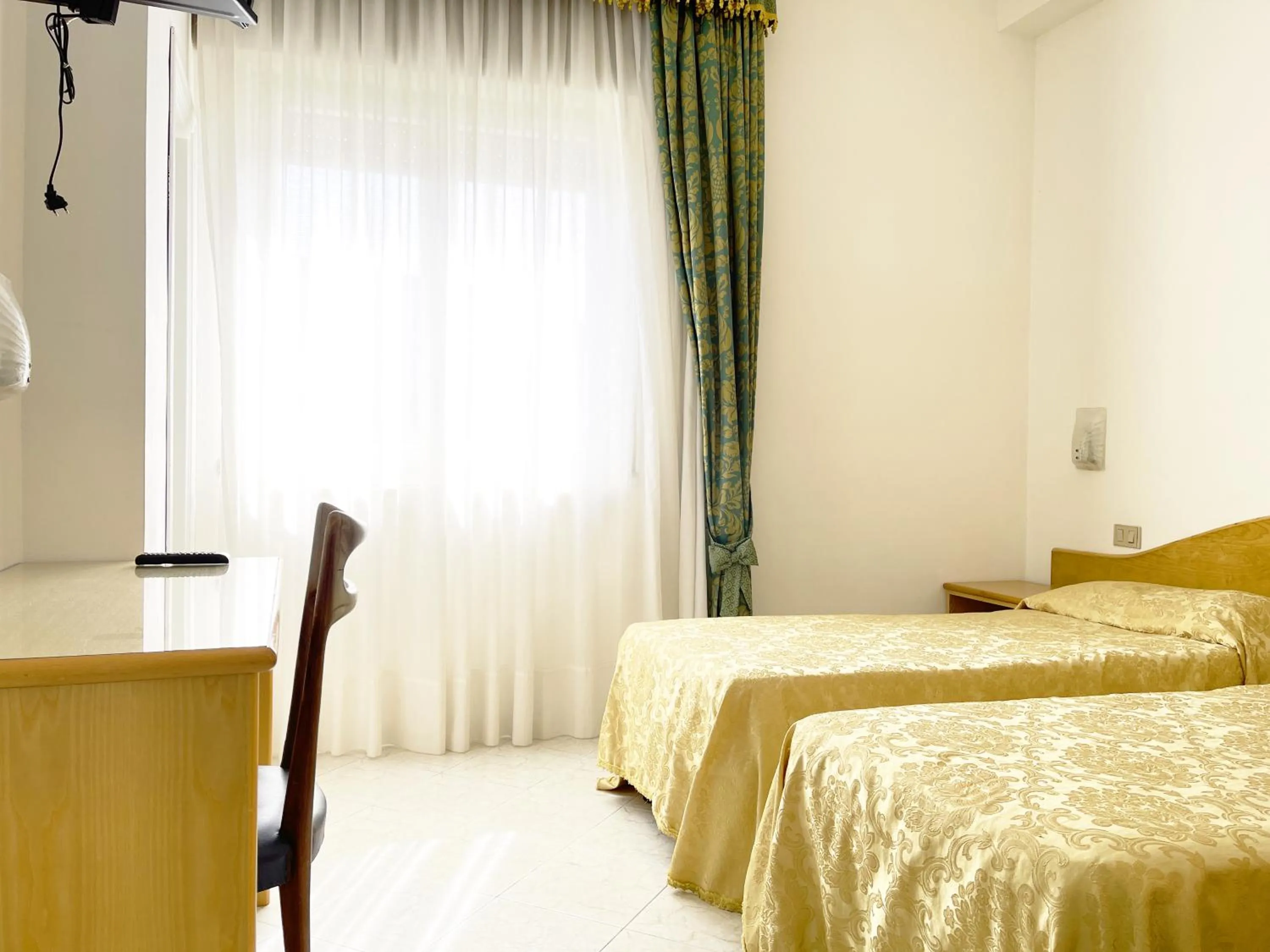 Bed in Hotel Reginella