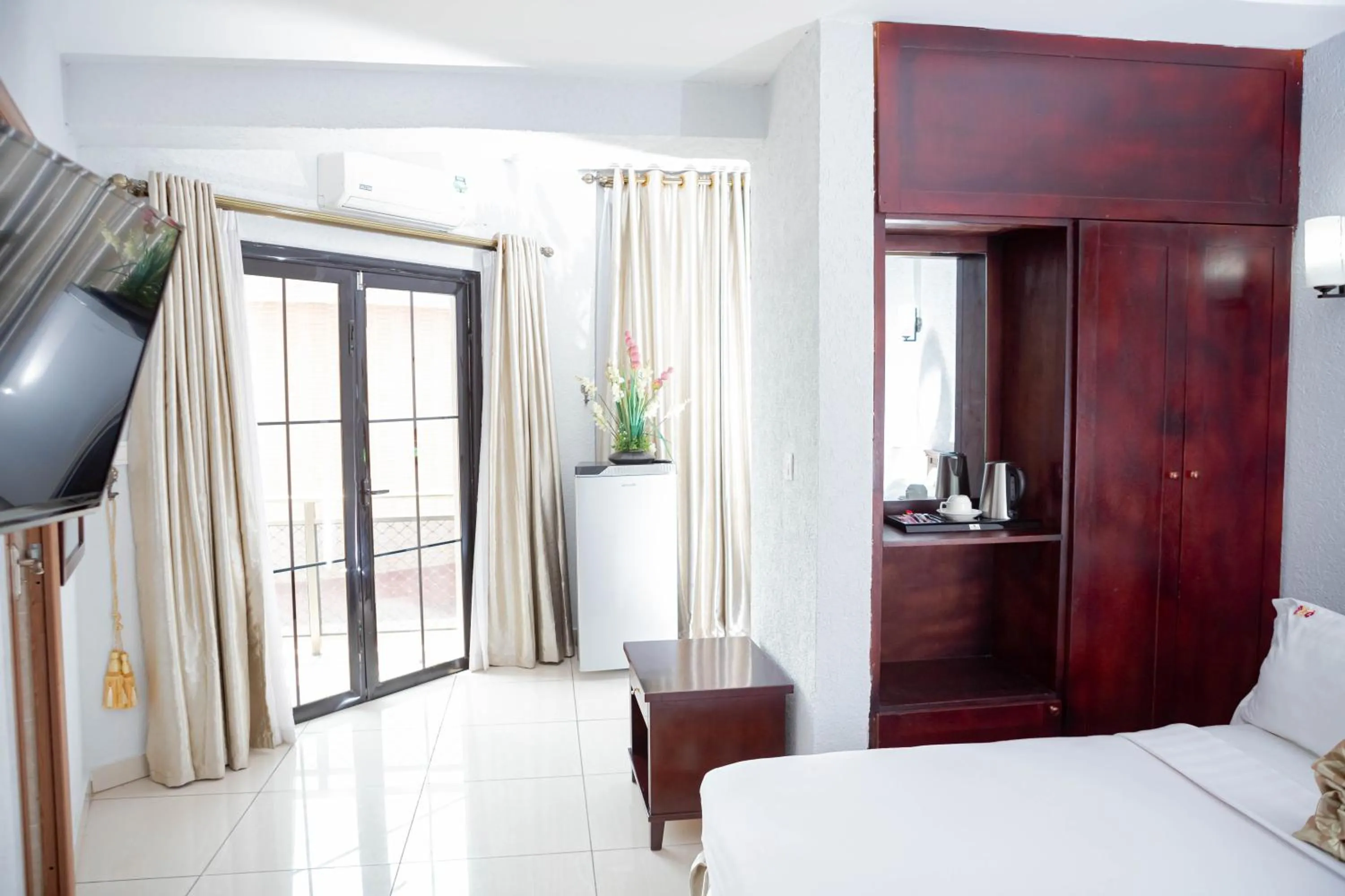 Bed in Hotel Hibiscus Louis