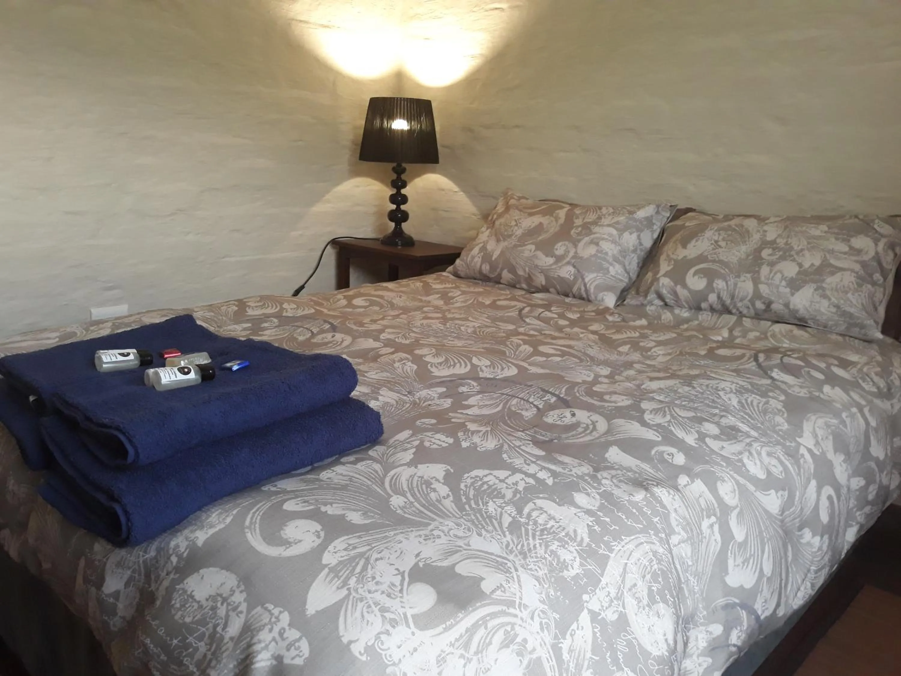 Bed in African Silhouette Guesthouse