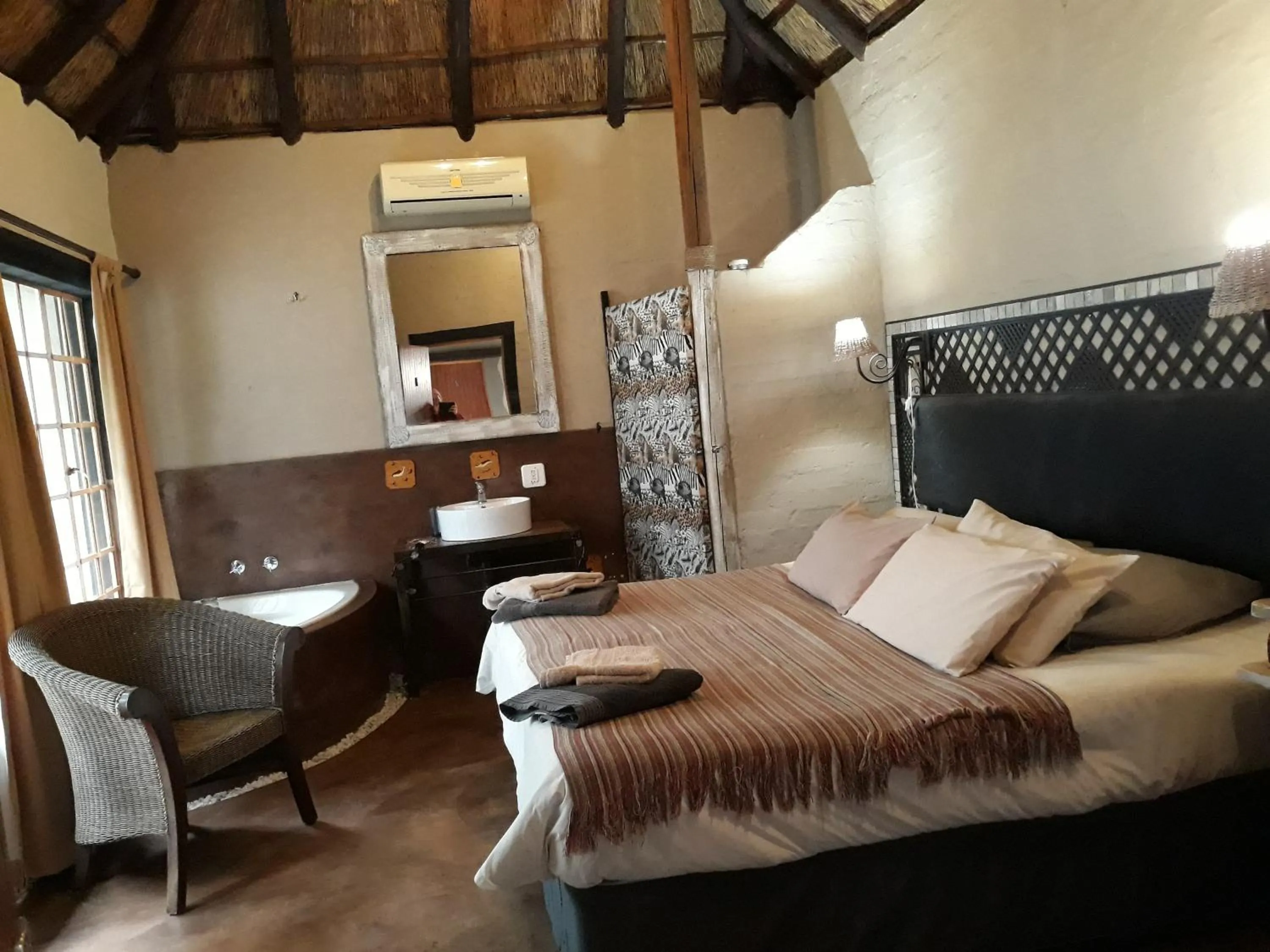 Bed in African Silhouette Guesthouse