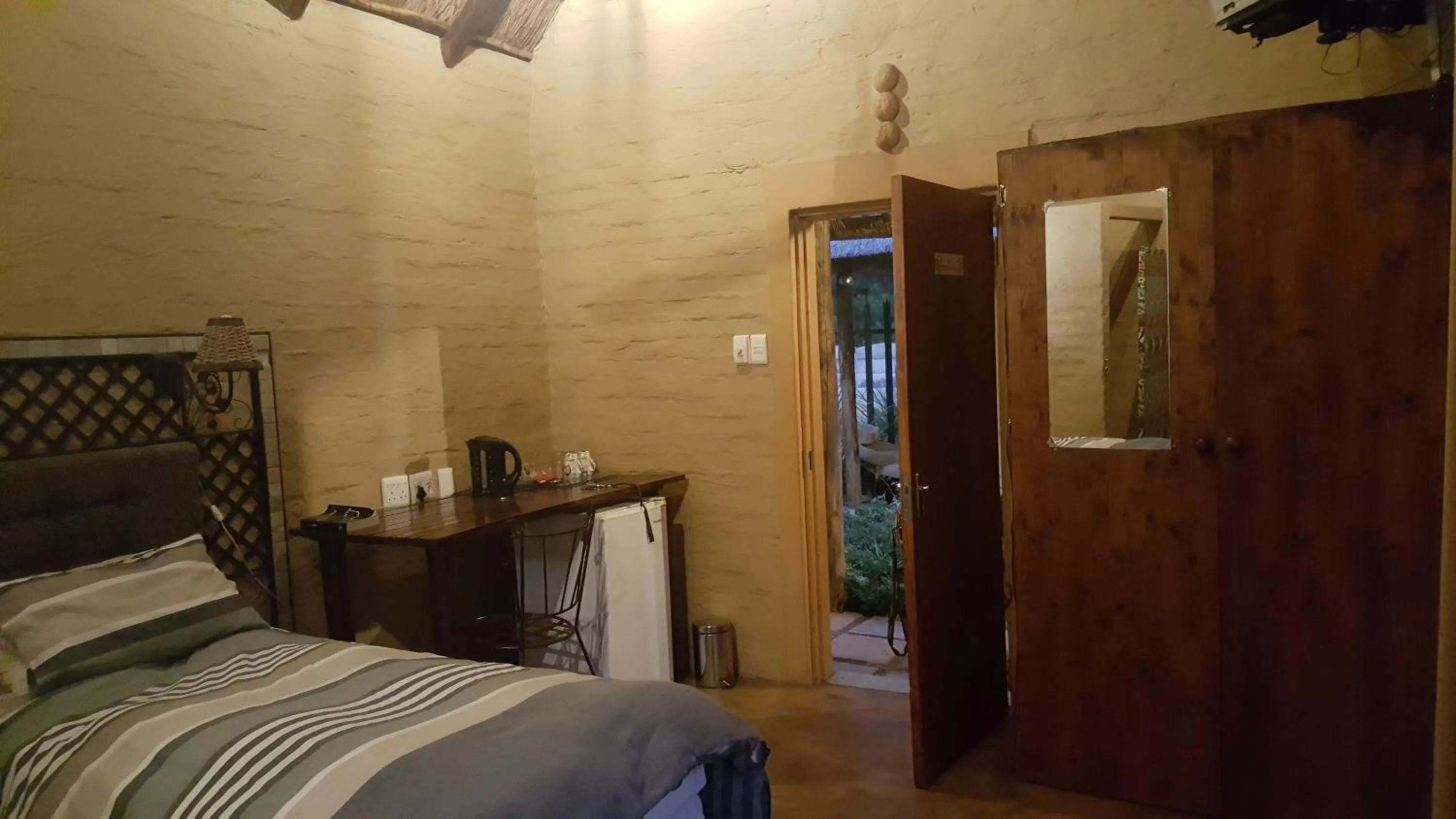 Bed in African Silhouette Guesthouse