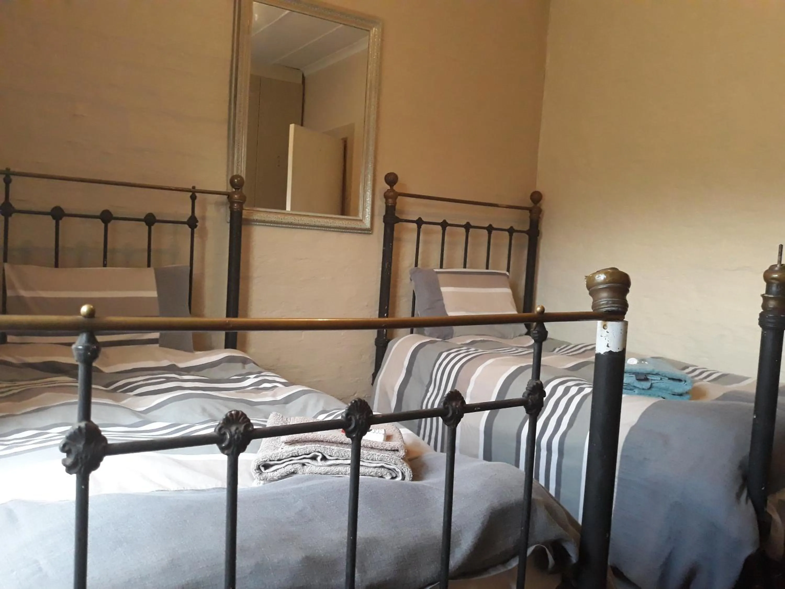 Bed in African Silhouette Guesthouse