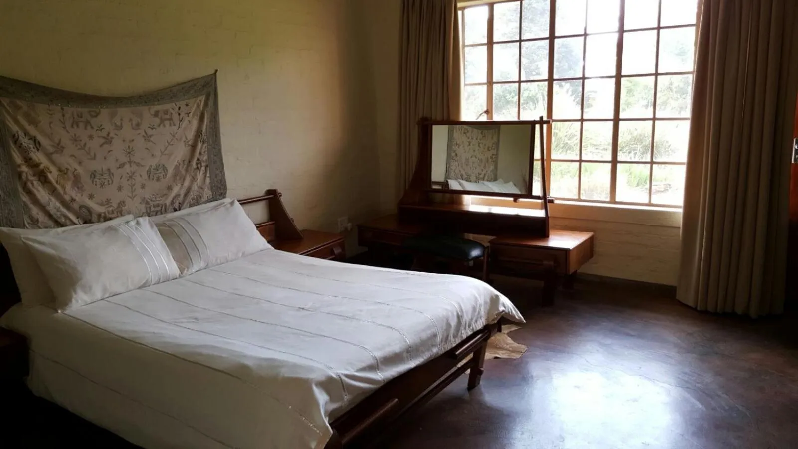 Bed in African Silhouette Guesthouse