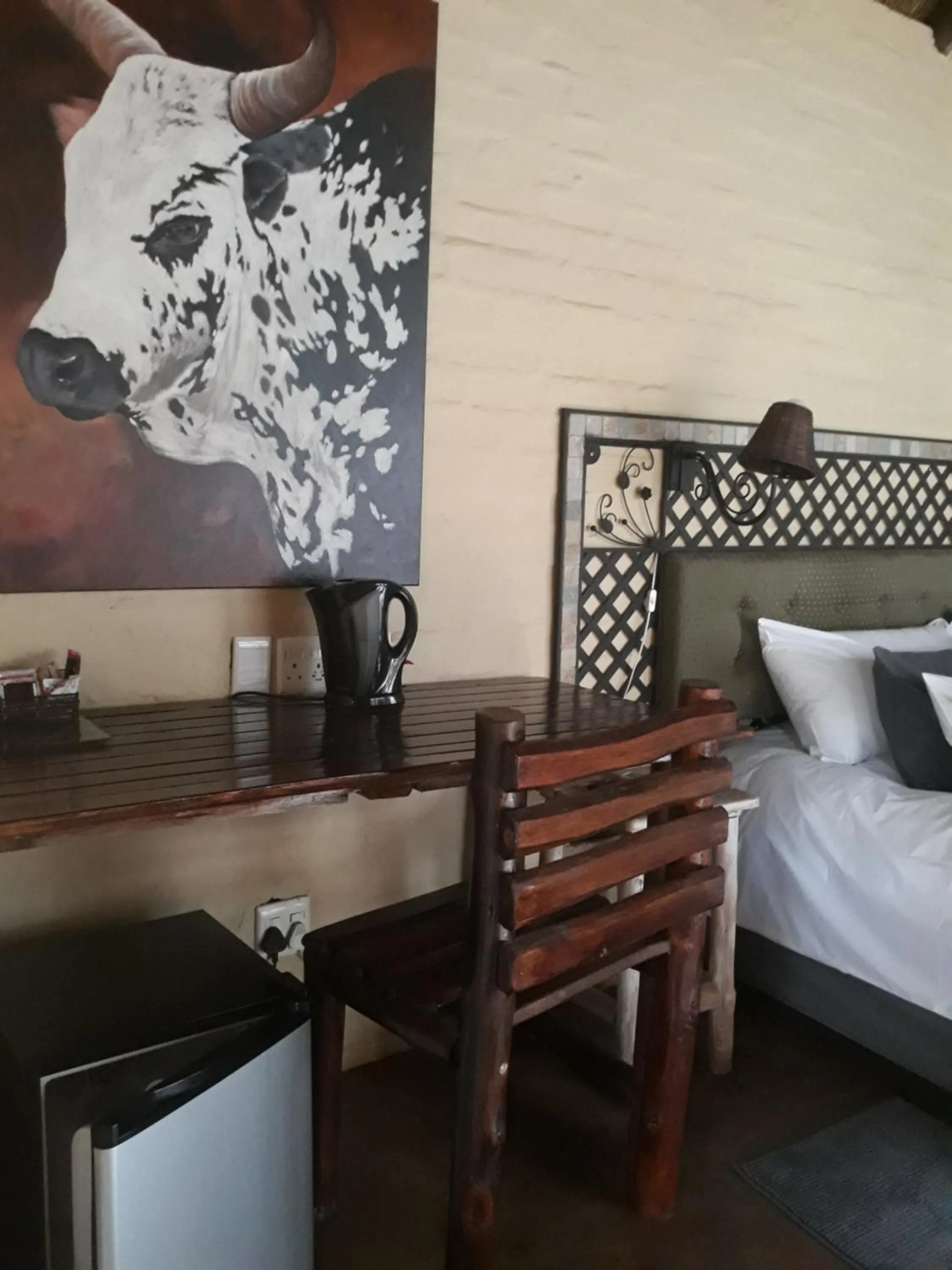 Bed in African Silhouette Guesthouse
