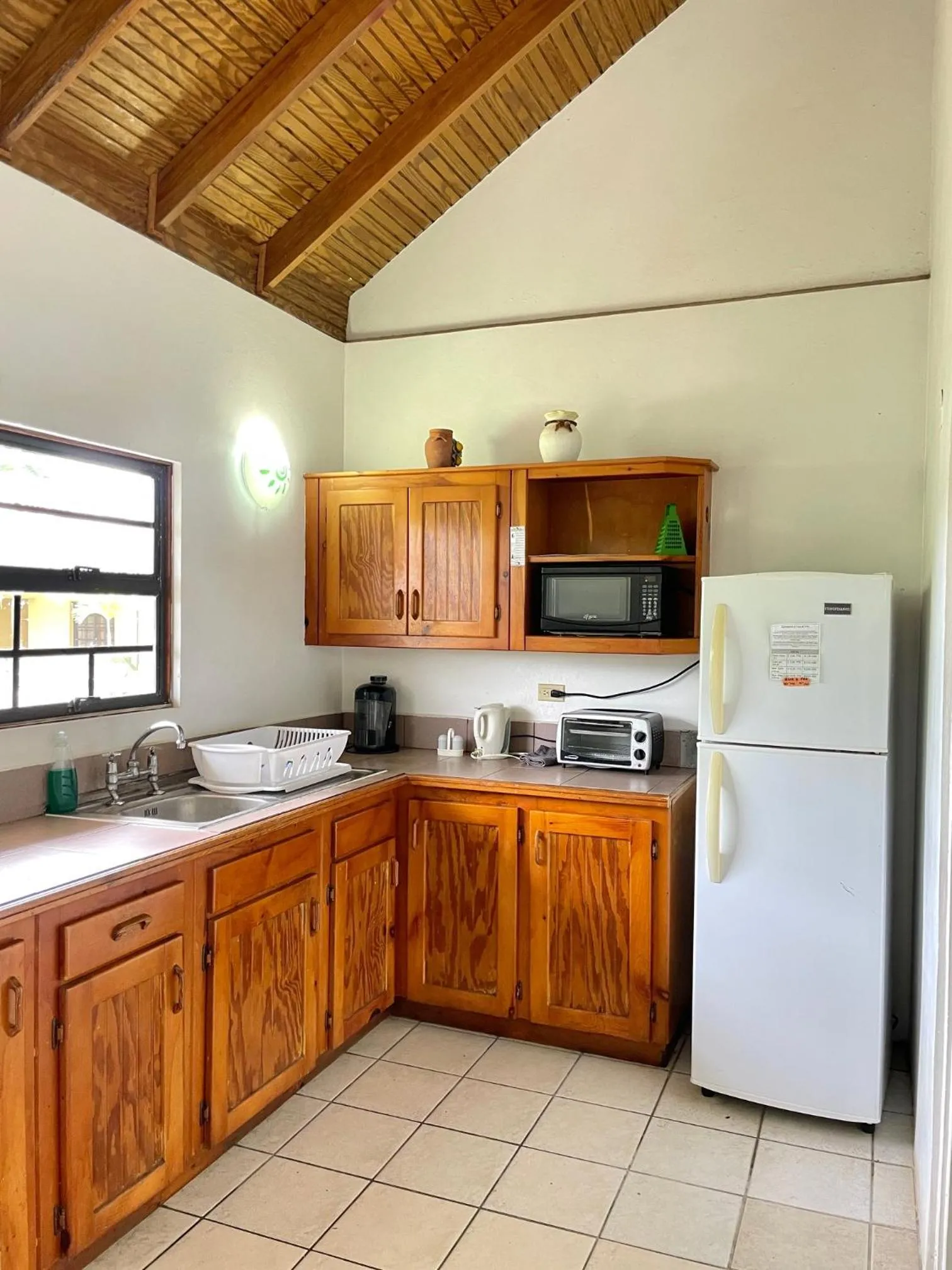 Kitchen or kitchenette in Bananaquit Tobago -Stay Near the Beach