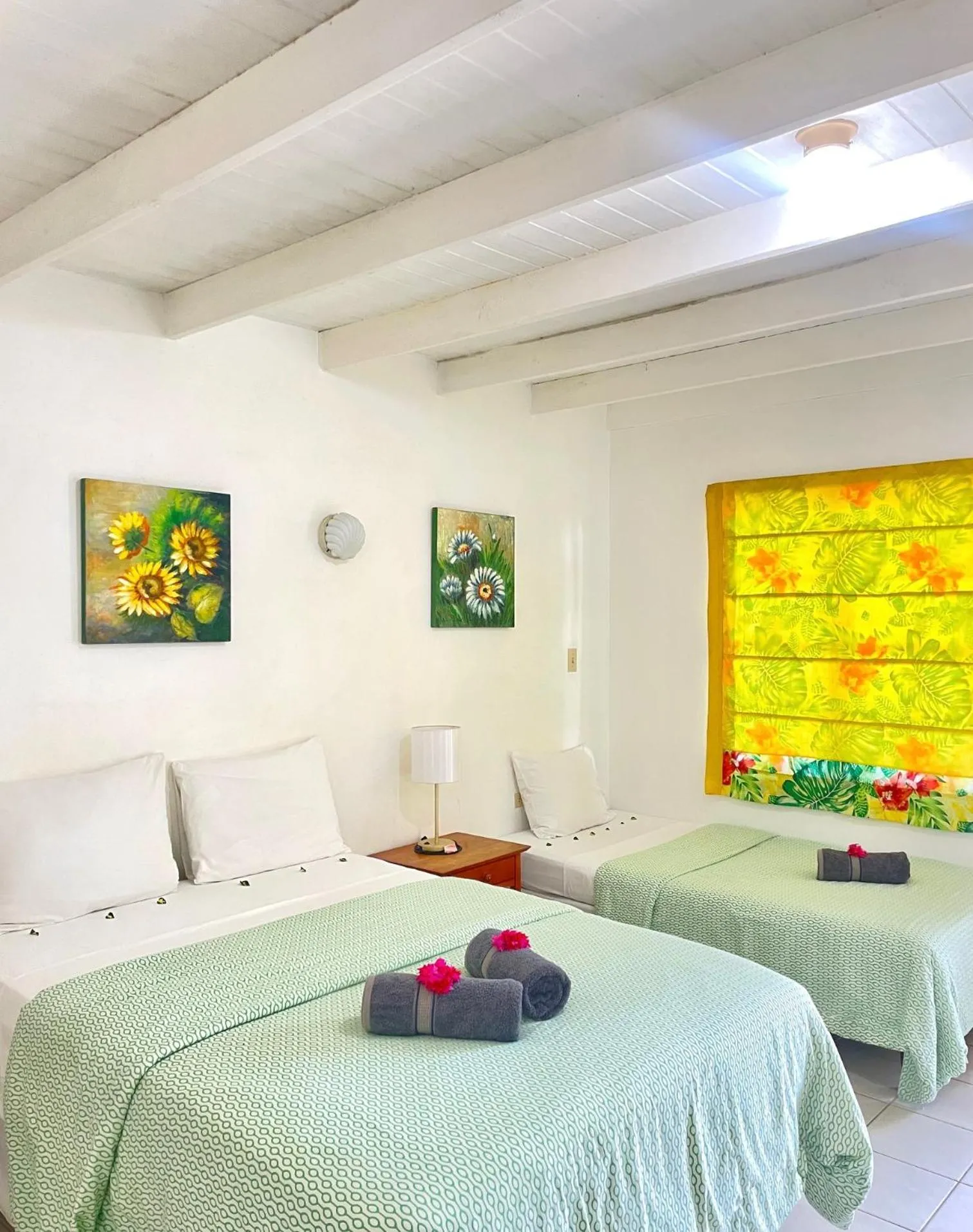 Photo of the whole room, Bed in Bananaquit Tobago -Stay Near the Beach
