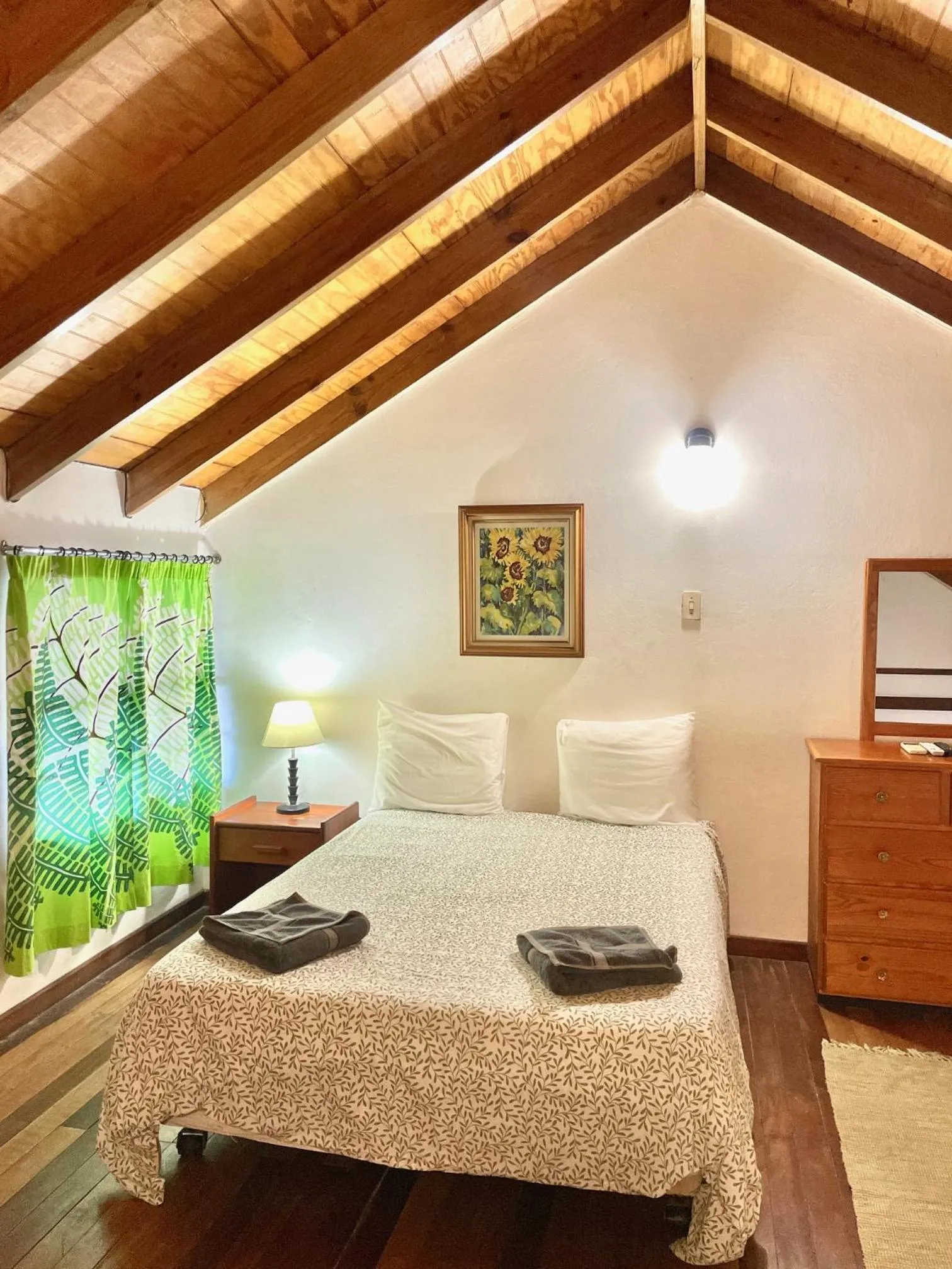 Photo of the whole room, Bed in Bananaquit Tobago -Stay Near the Beach