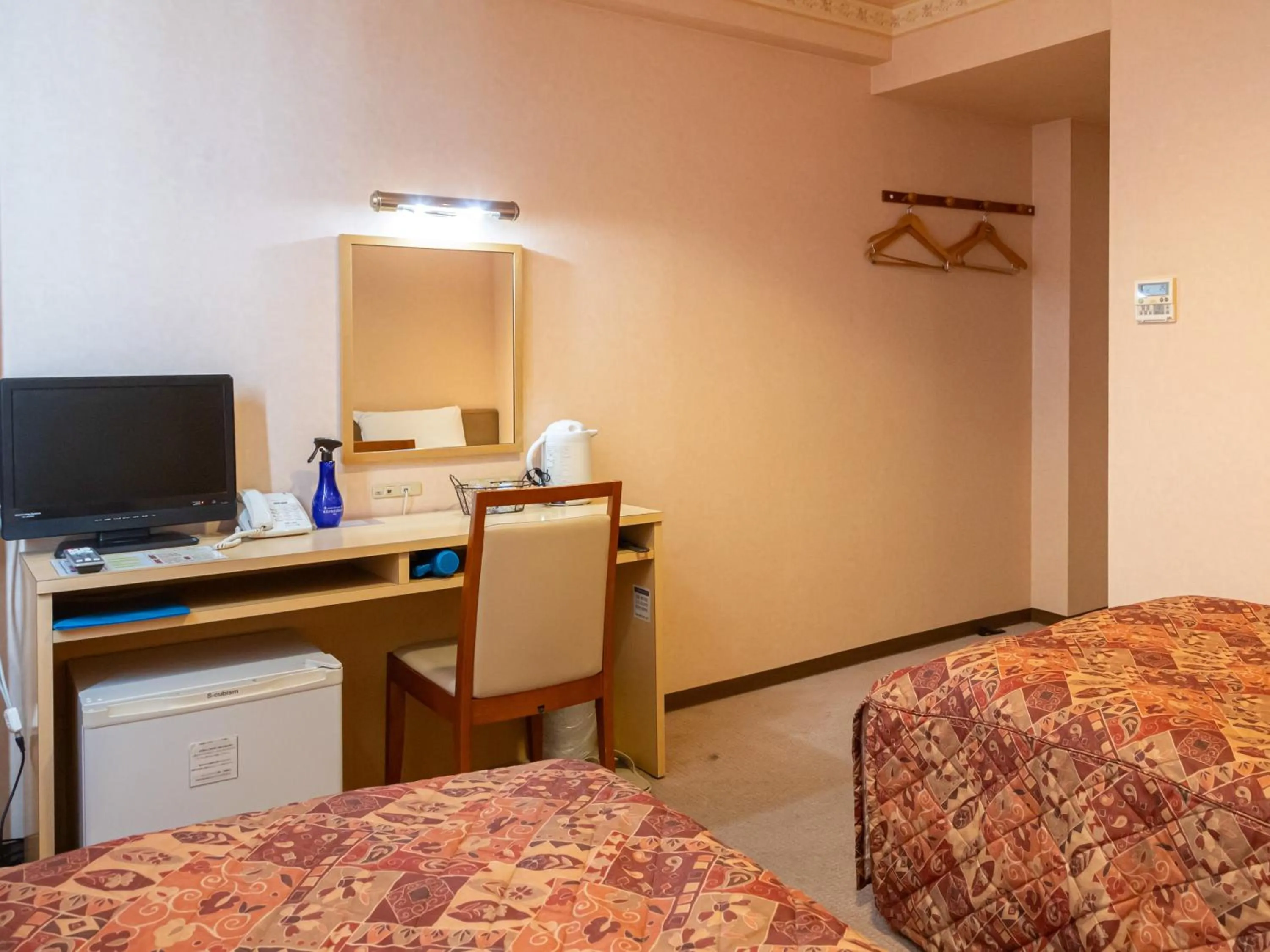 Bed in Tabist Hirosaki Touei Hotel