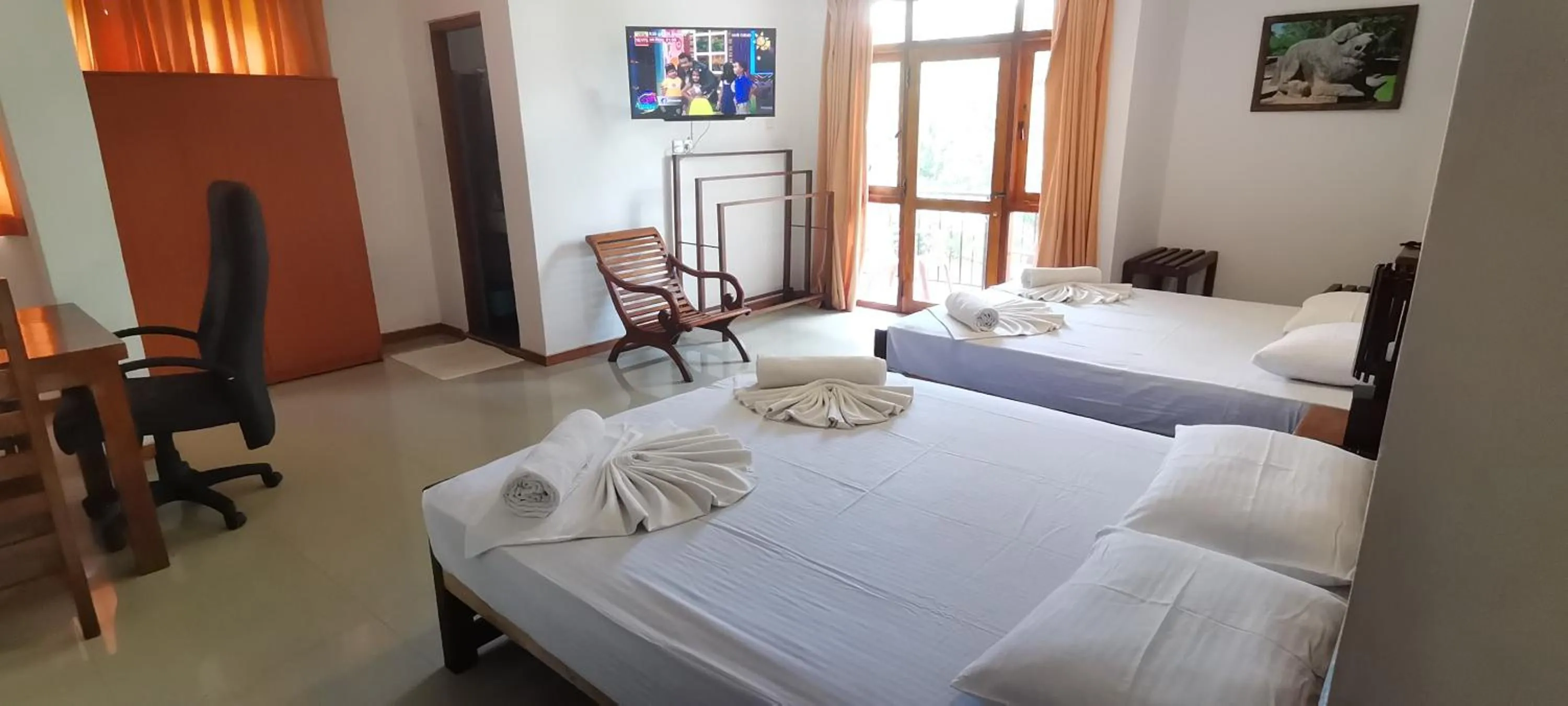 Photo of the whole room, Bed in Rajarata Family Resort
