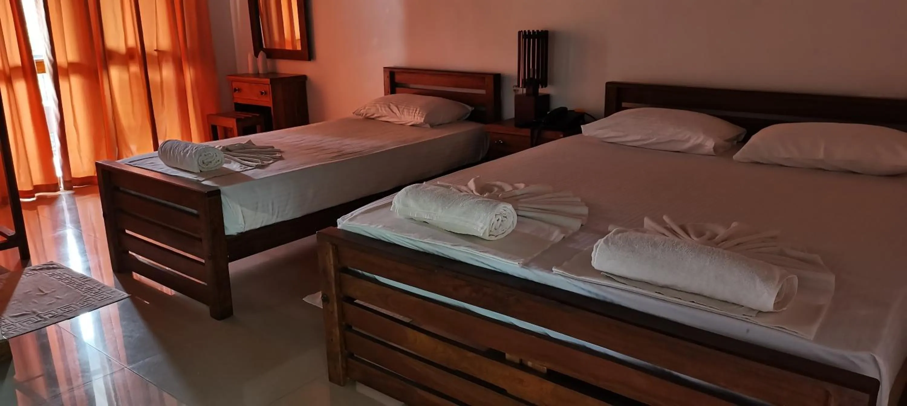 Bed in Rajarata Family Resort
