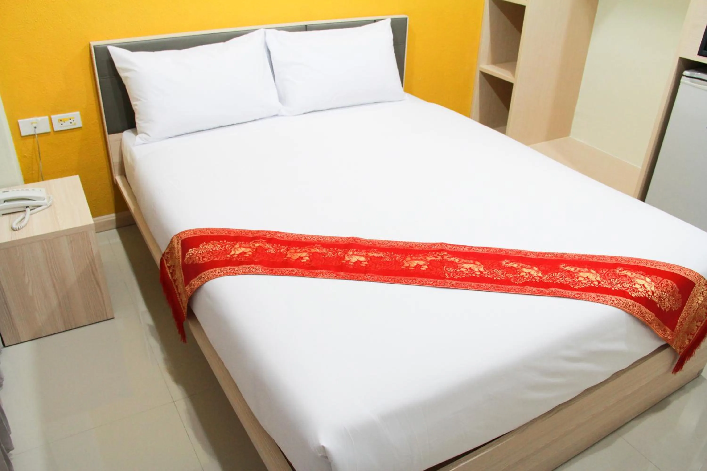 Bed in La Porte Hotel Bangkok