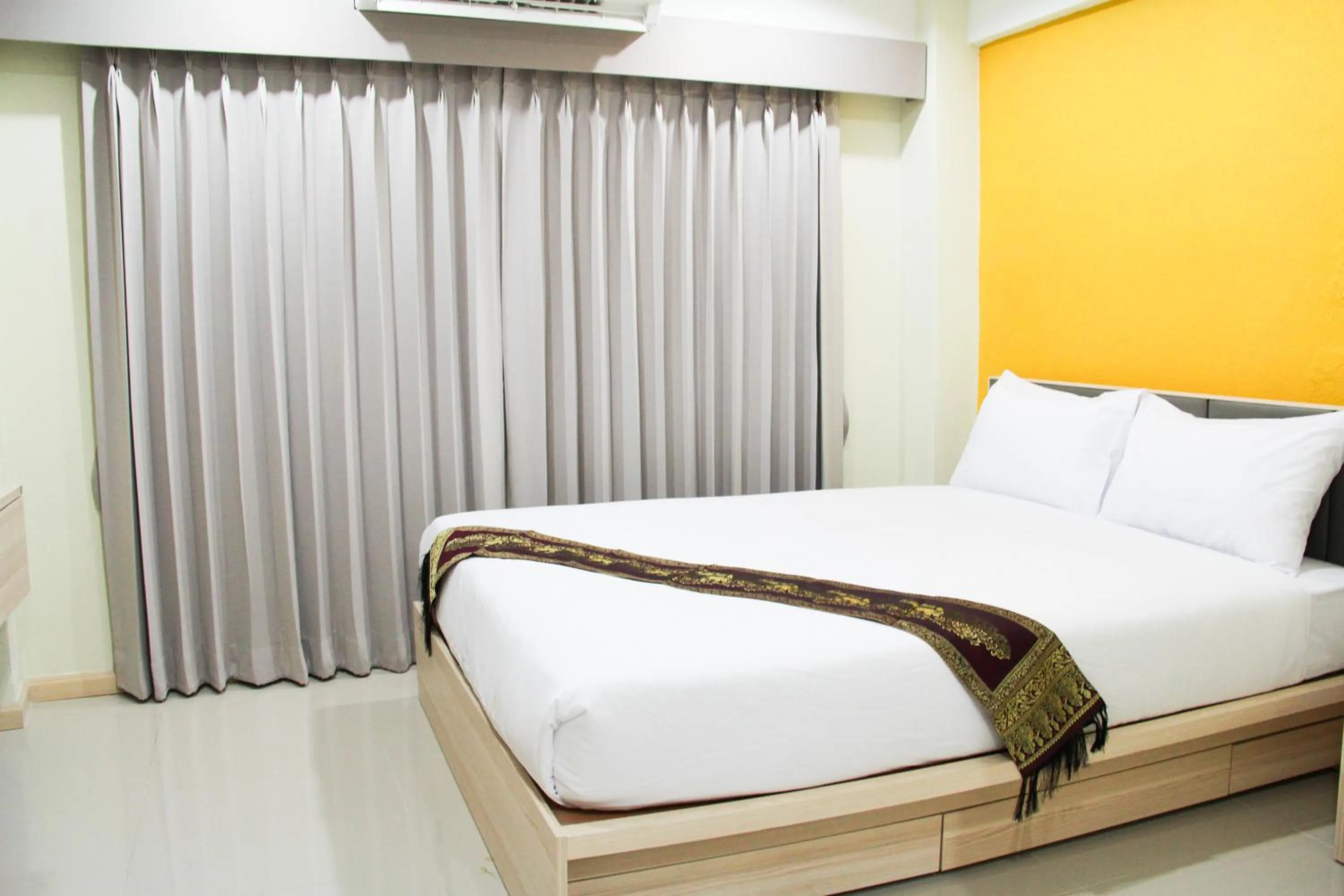 Bed in La Porte Hotel Bangkok