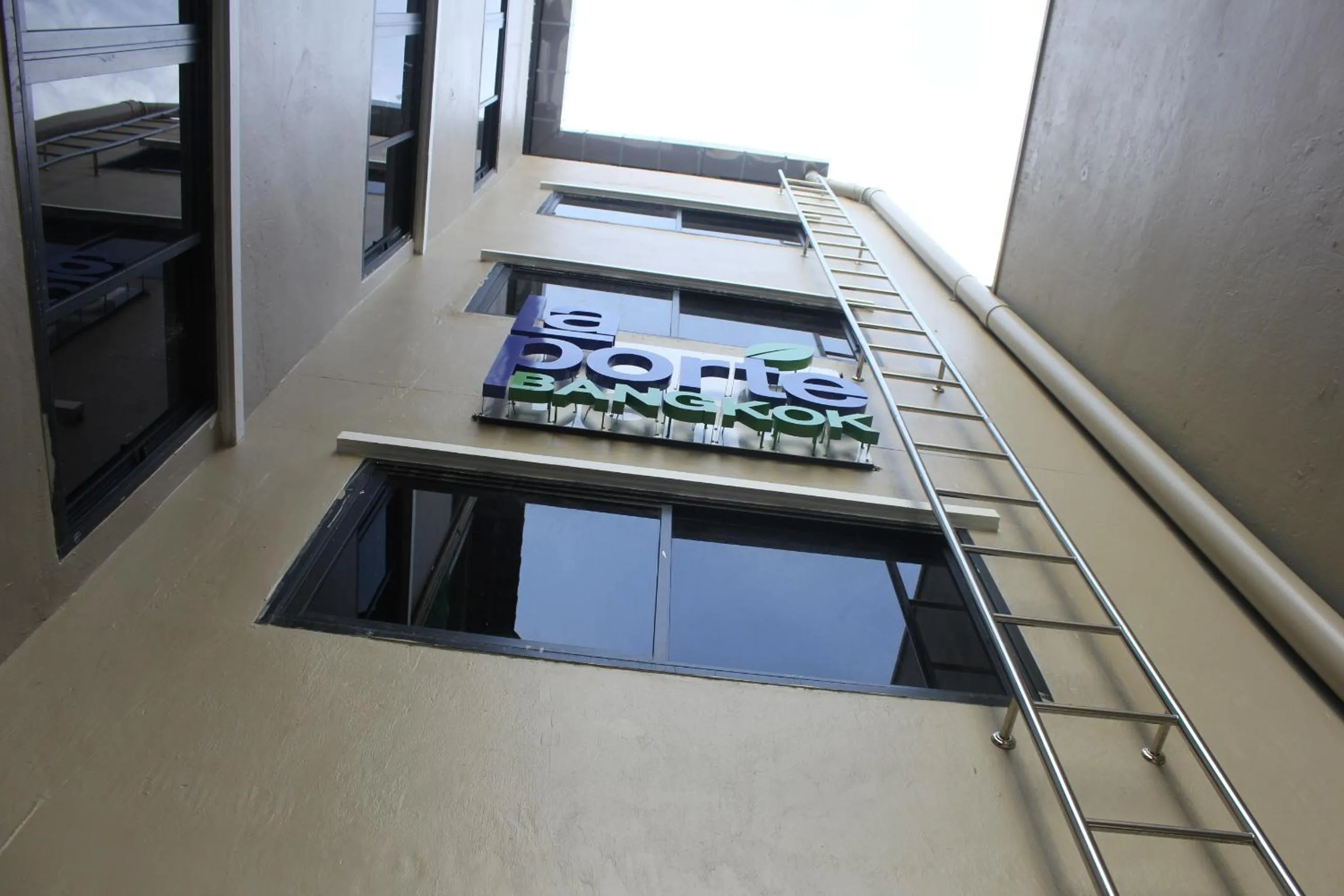 Property logo or sign in La Porte Hotel Bangkok