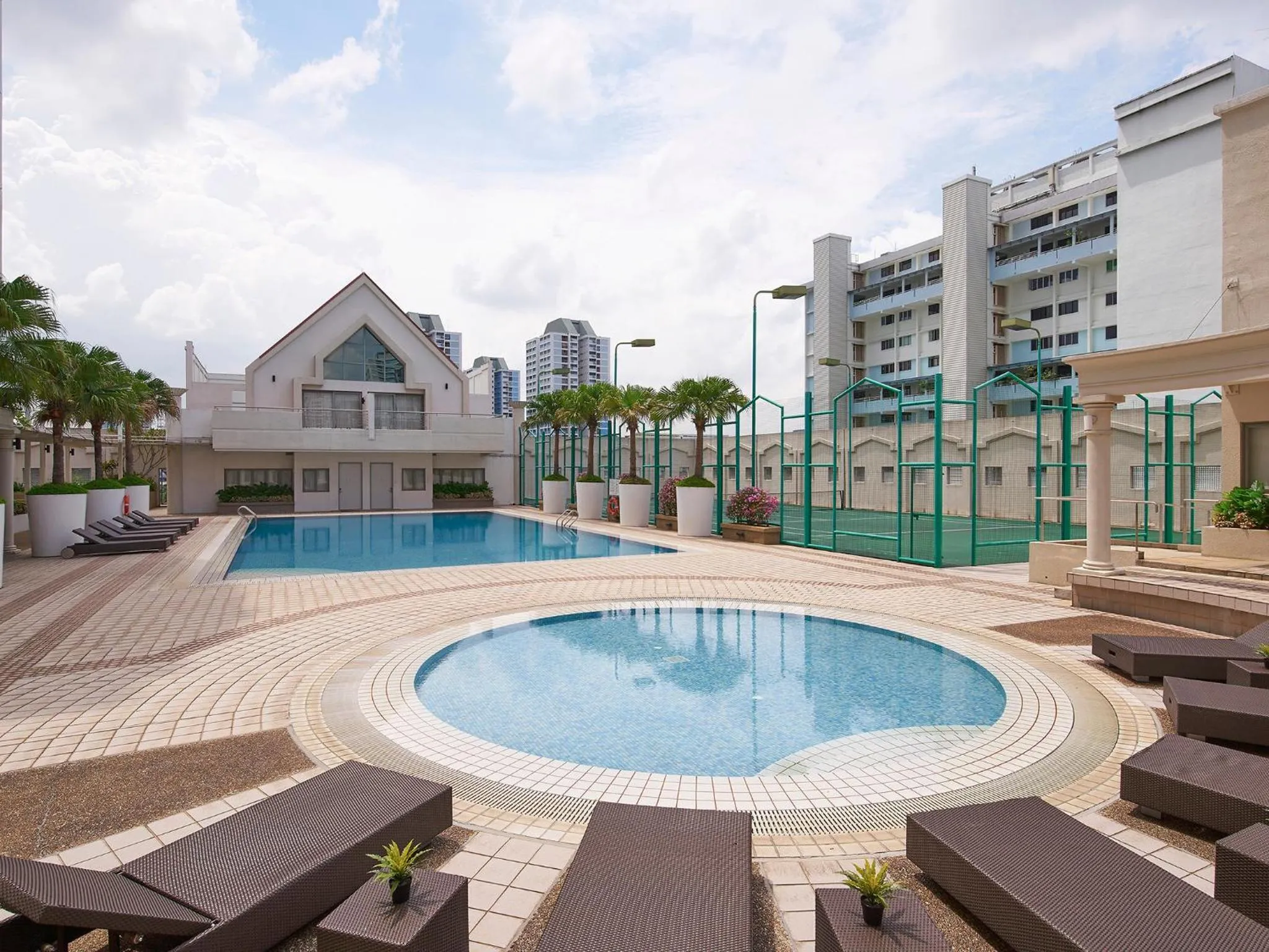 Swimming pool in Village Residence West Coast by Far East Hospitality