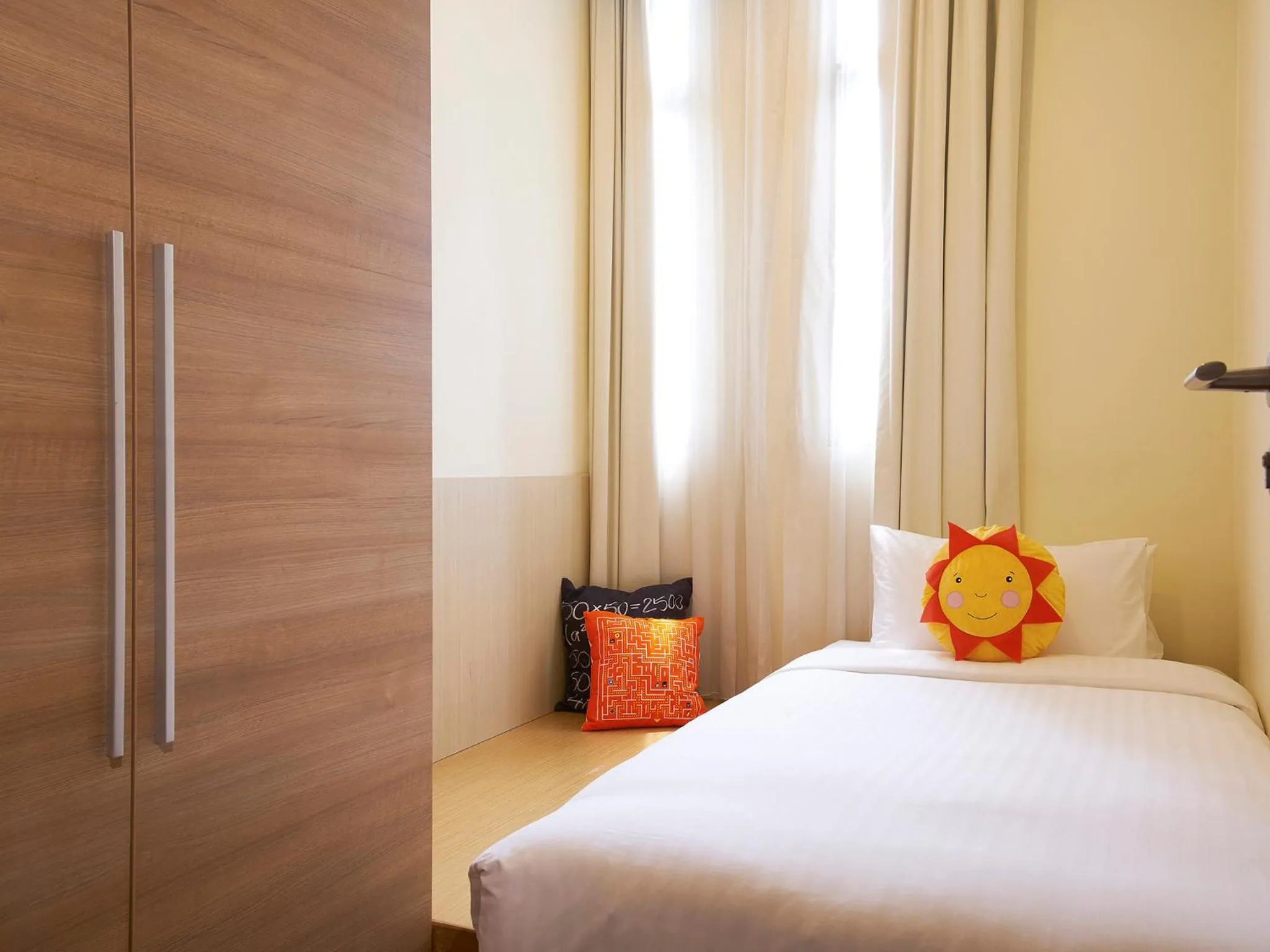 Bed in Village Residence West Coast by Far East Hospitality