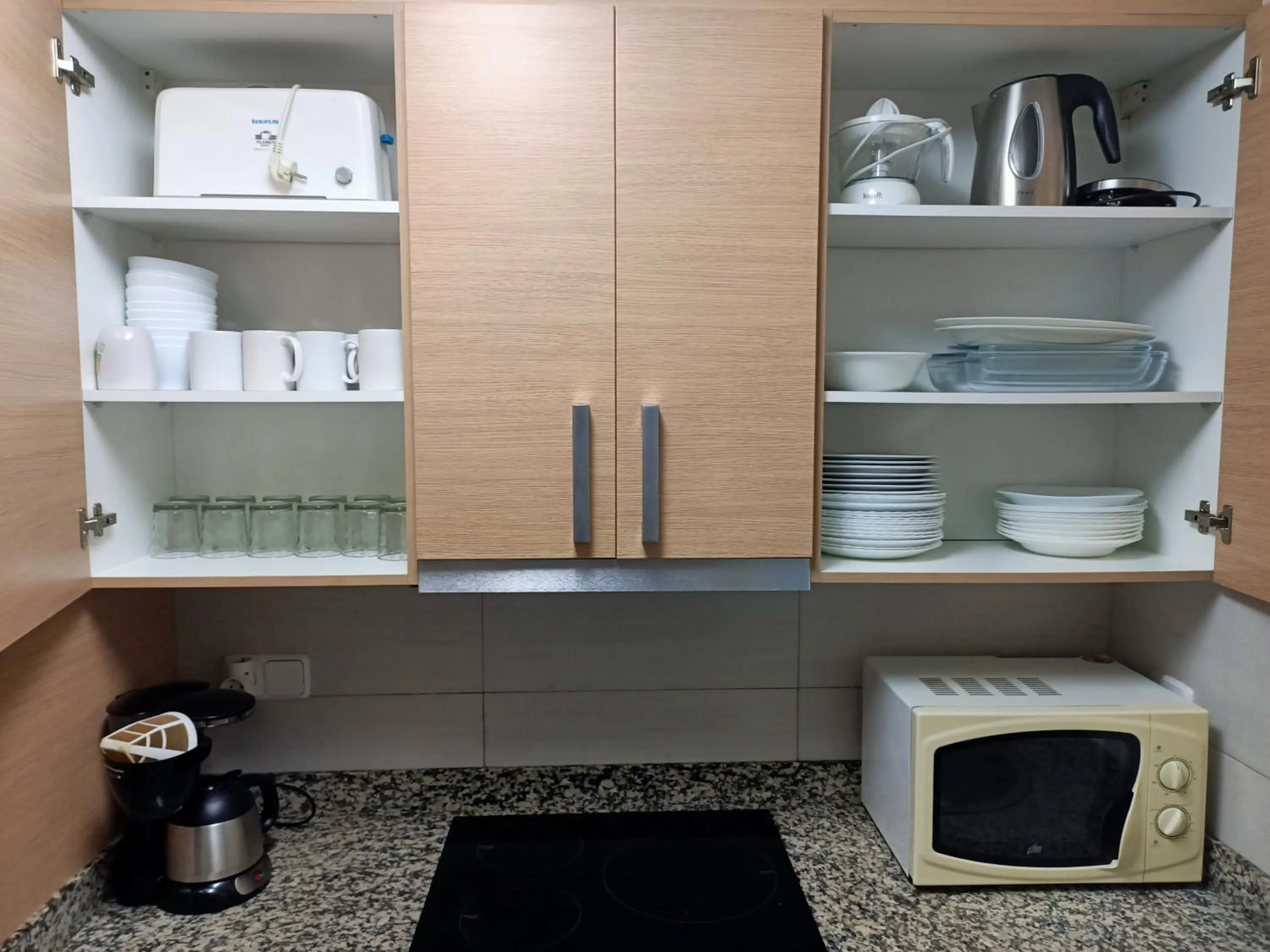 Kitchen or kitchenette in Piso Jover alojamiento en primera línea del Mar !!