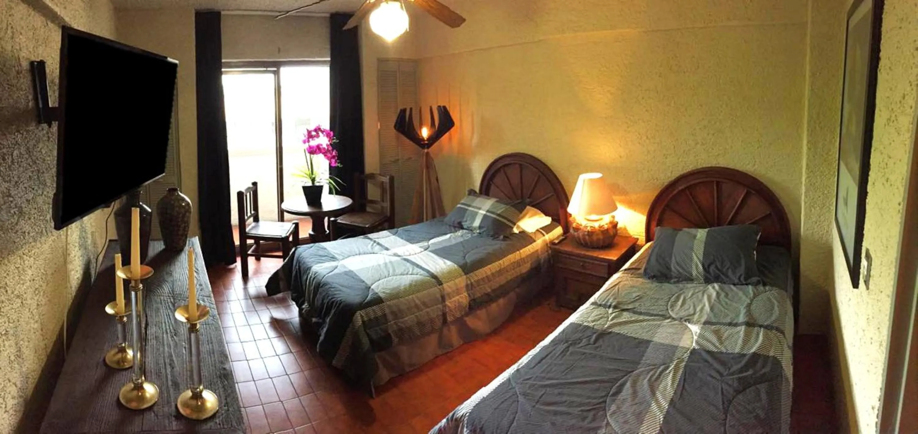 Photo of the whole room, Bed in Aurora Suites