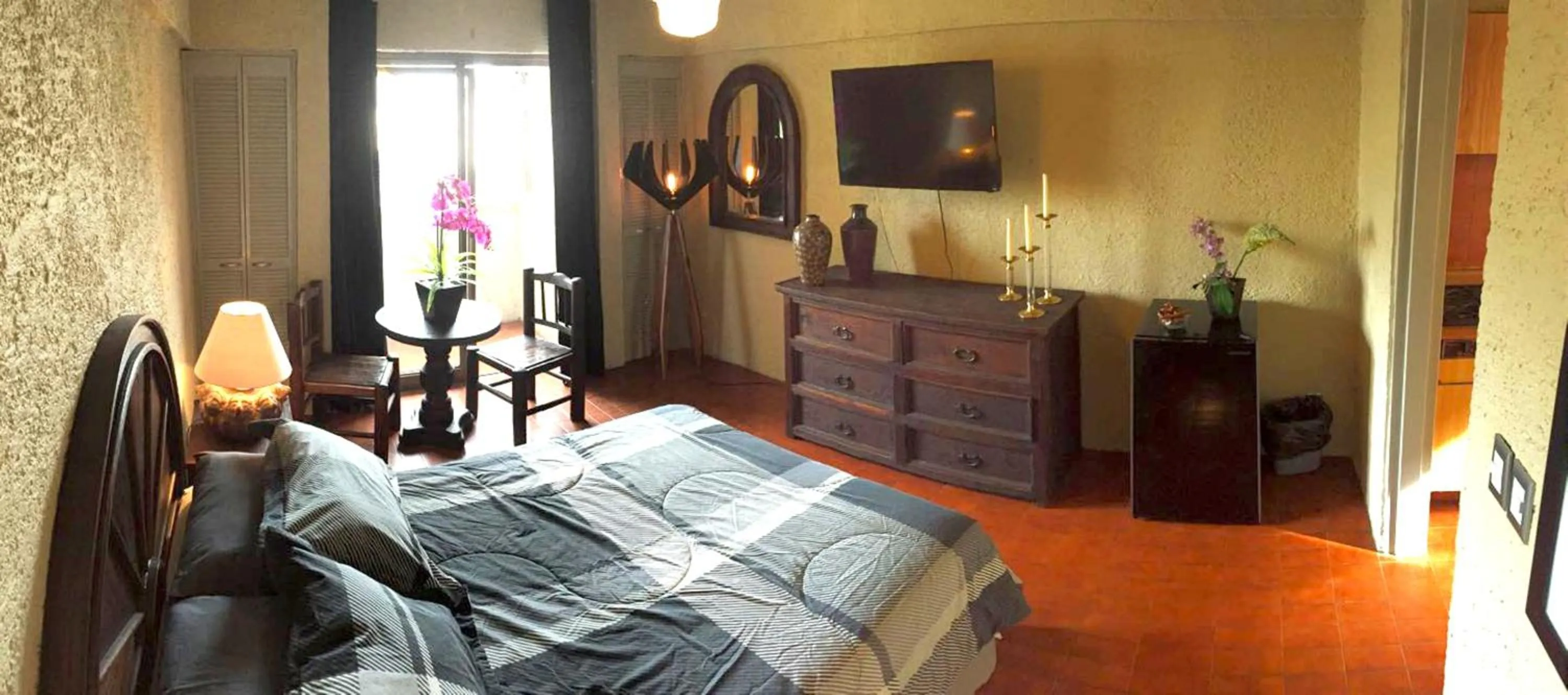 Photo of the whole room, Bed in Aurora Suites