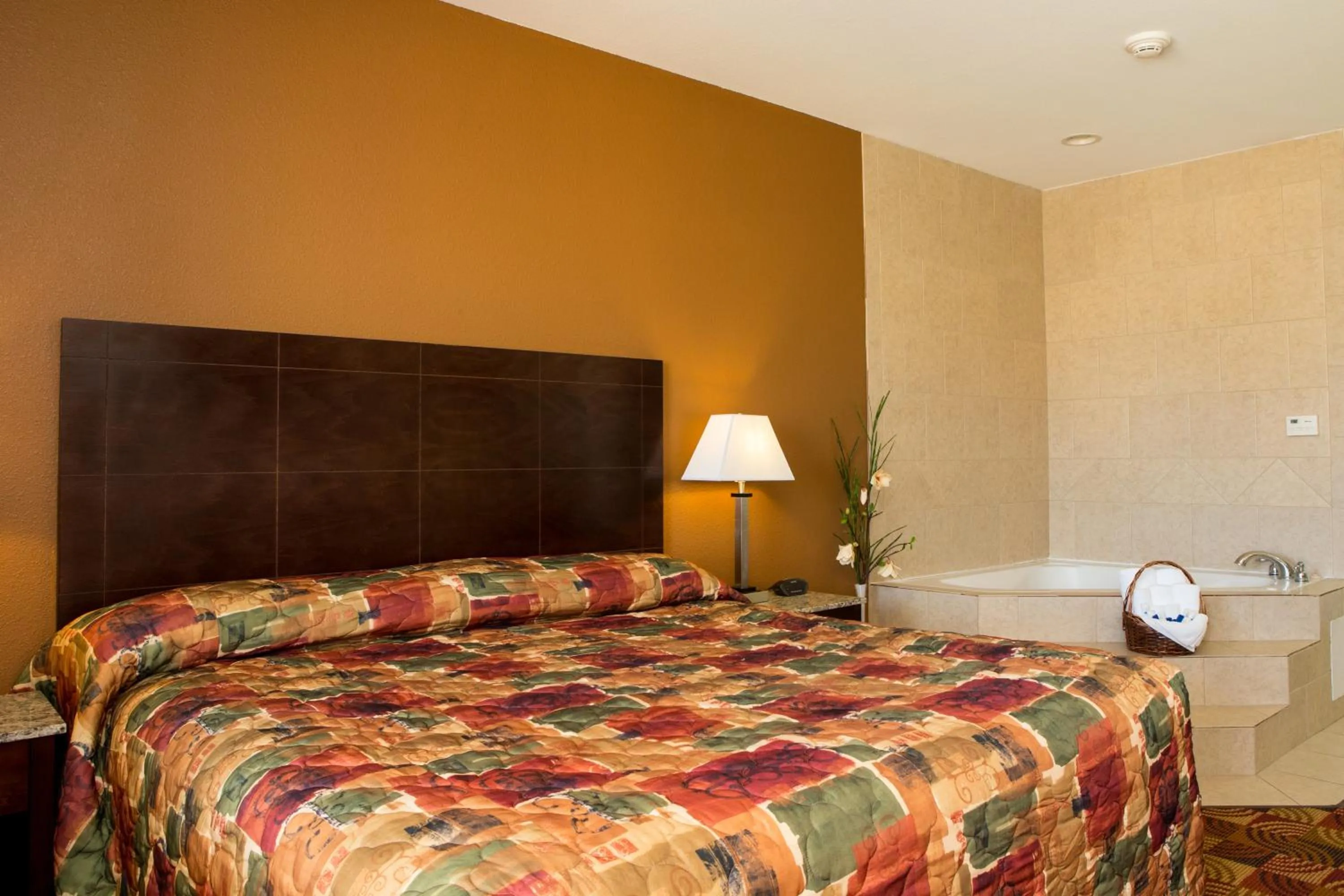 Bed in Sands Inn & Suites