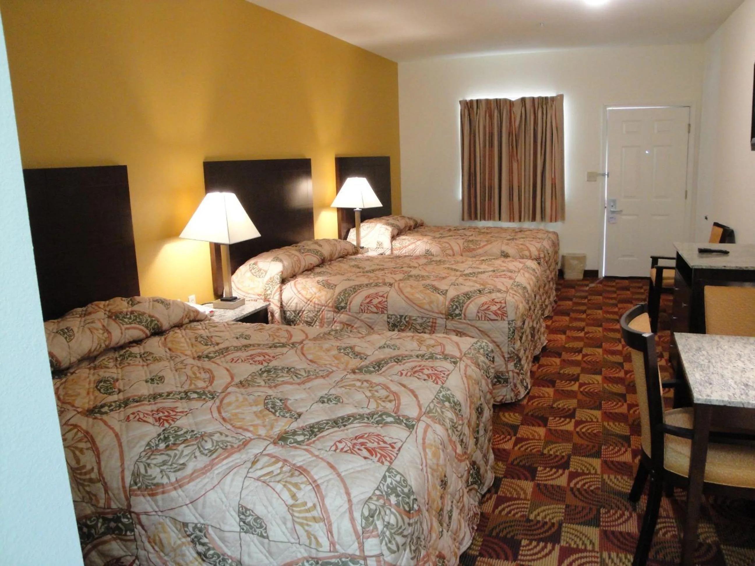 Bed in Sands Inn & Suites